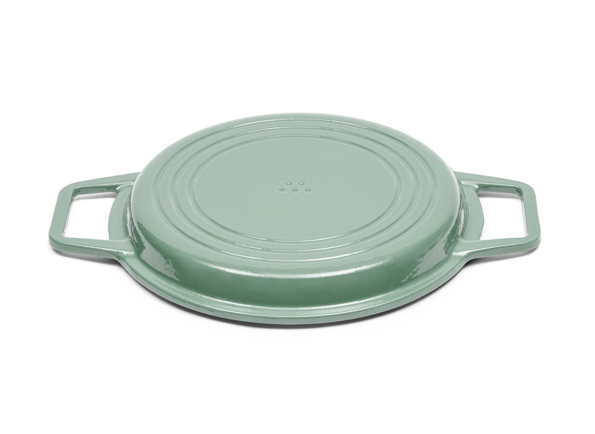 {{7-qt-grill-green}} Green Grill Lid for 7-quart Dutch oven face down on white background.