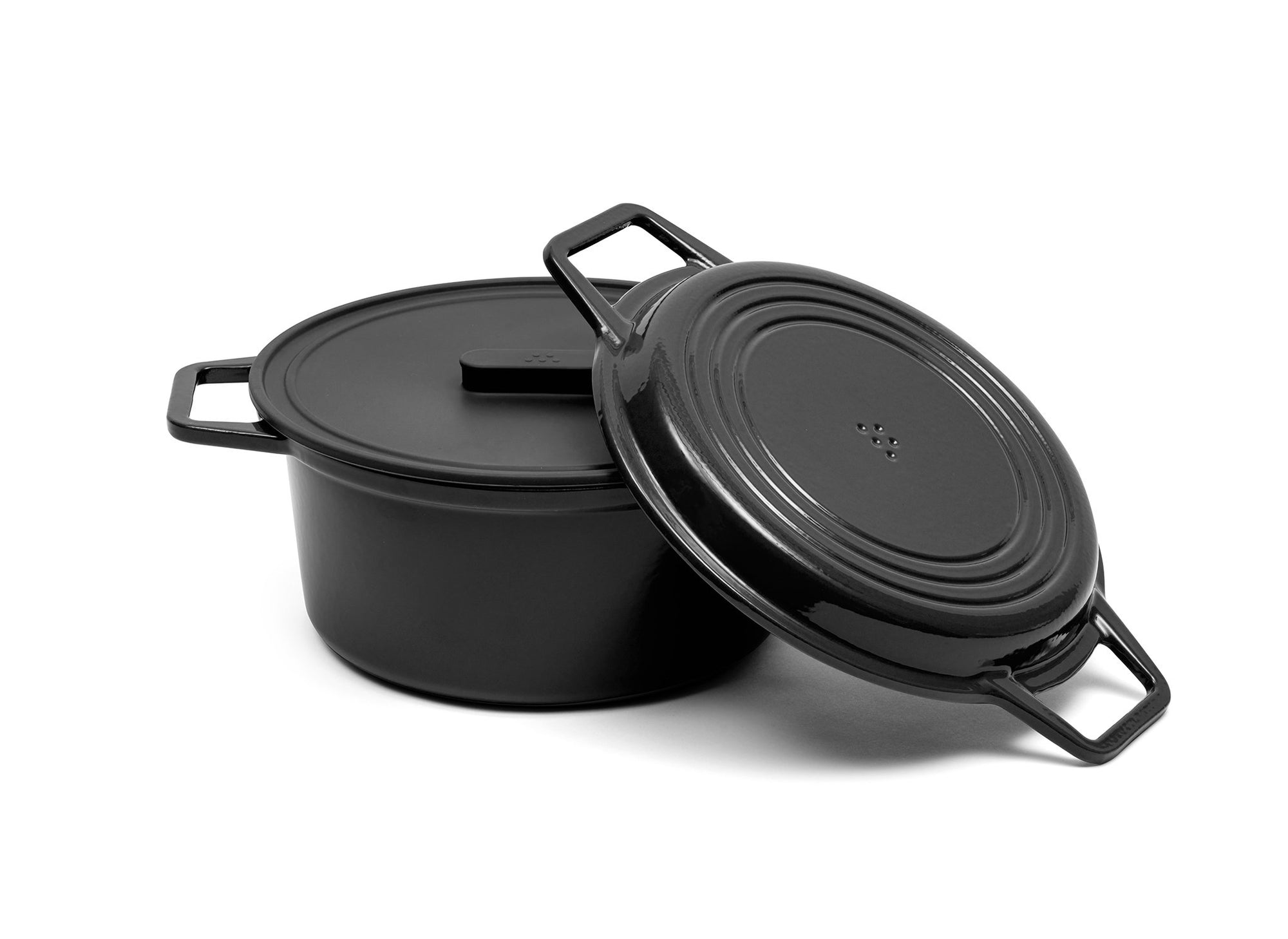 {{7-qt-grill-black}} A black 7-quart Misen Dutch Oven with matching Grill Lid and silicone Universal Lid.