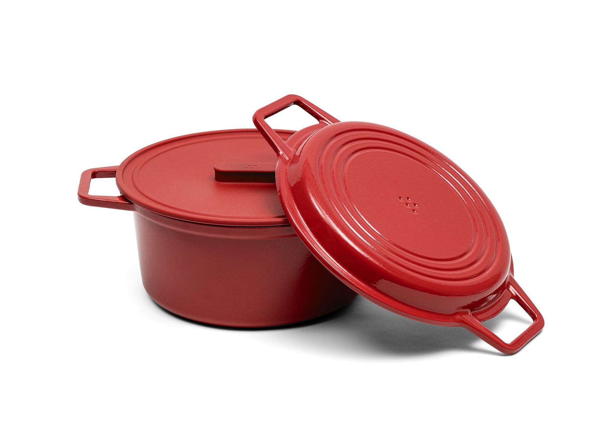 {{7-qt-grill-red}} A red 7-quart Misen Dutch Oven with matching Grill Lid and silicone Universal Lid.