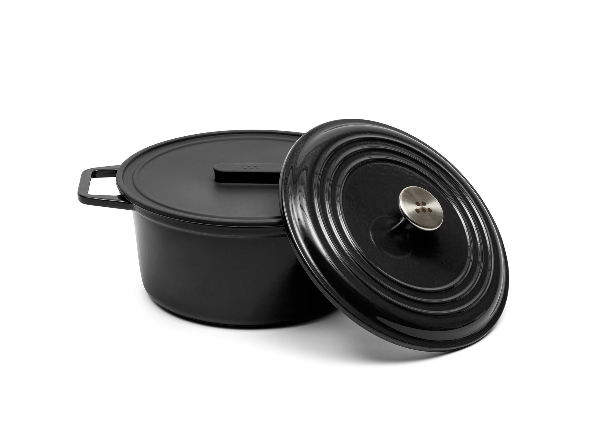 {{}} A black 7-quart Misen Dutch Oven with matching Traditional knob-style lid and silicone Universal Lid.
