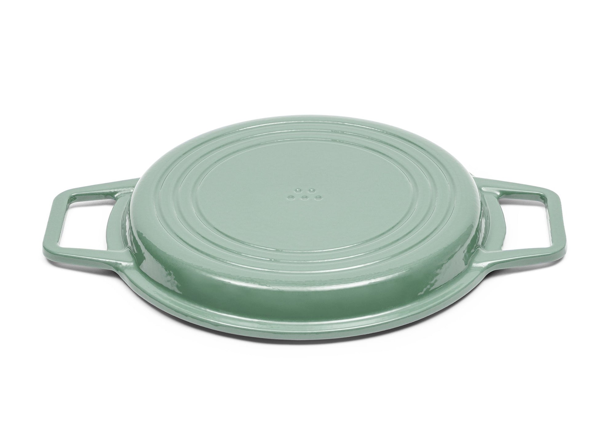 {{9-qt-grill-green}} Green Grill Lid for 9-quart Dutch oven face down on white background.