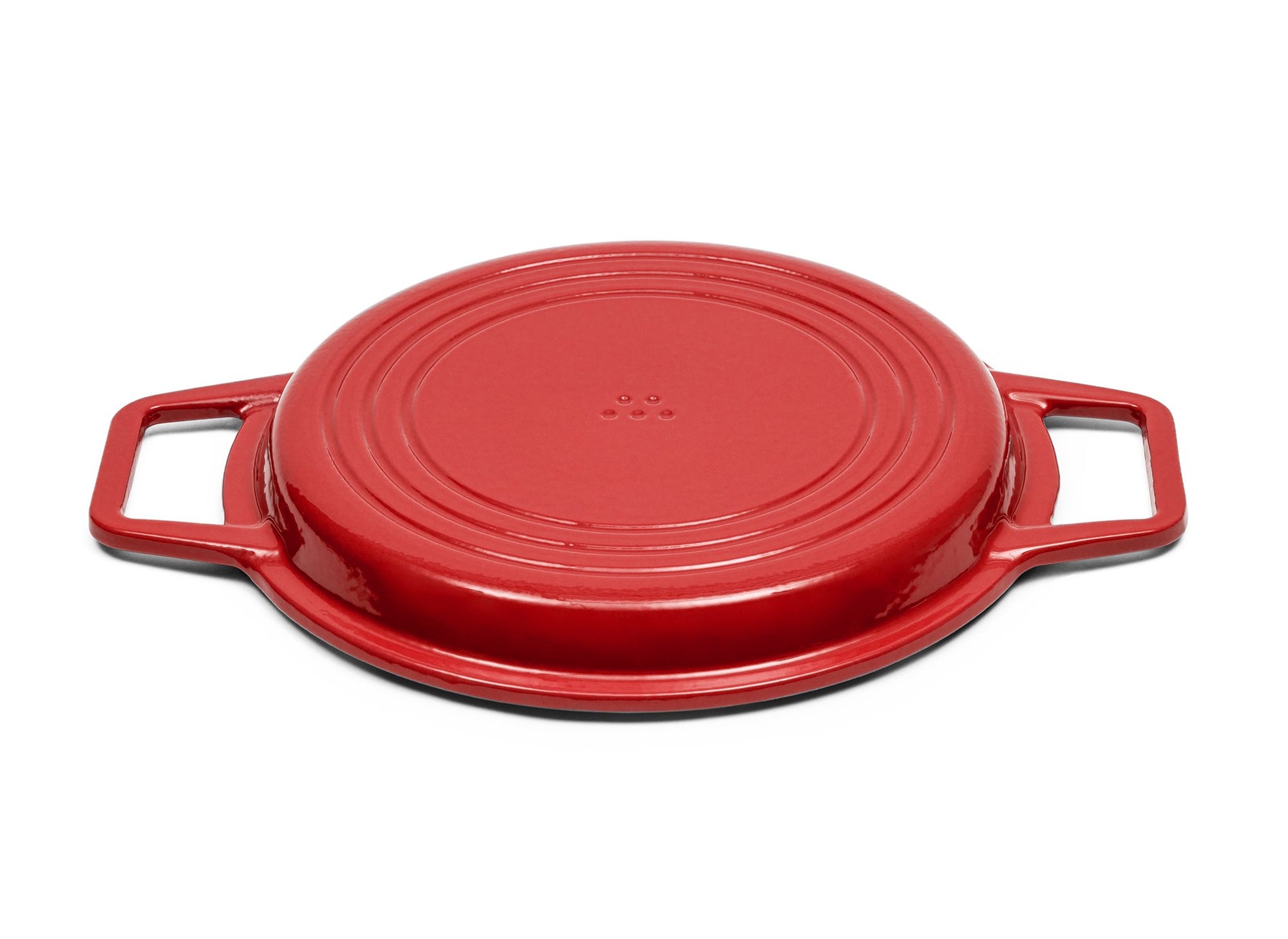 {{9-qt-grill-red}} Red Grill Lid for 9-quart Dutch oven face down on white background.