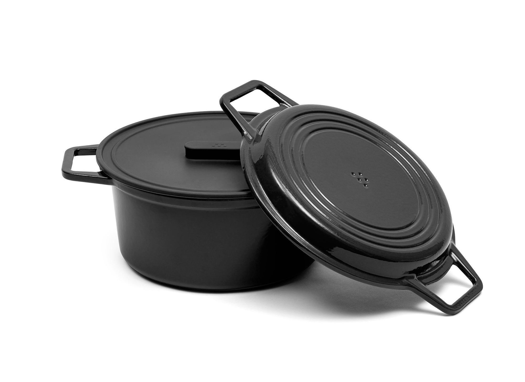 {{9-qt-grill-black}} A black 9-quart Misen Dutch Oven with matching Grill Lid and silicone Universal Lid.