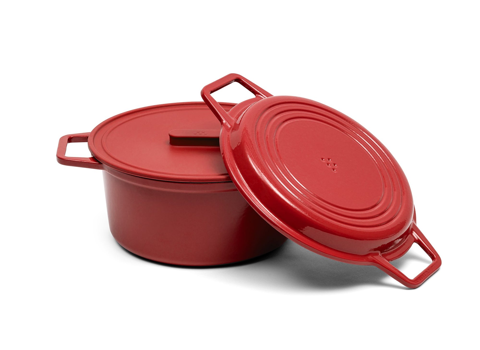 {{9-qt-grill-red}} A red 9-quart Misen Dutch Oven with matching Grill Lid and silicone Universal Lid.