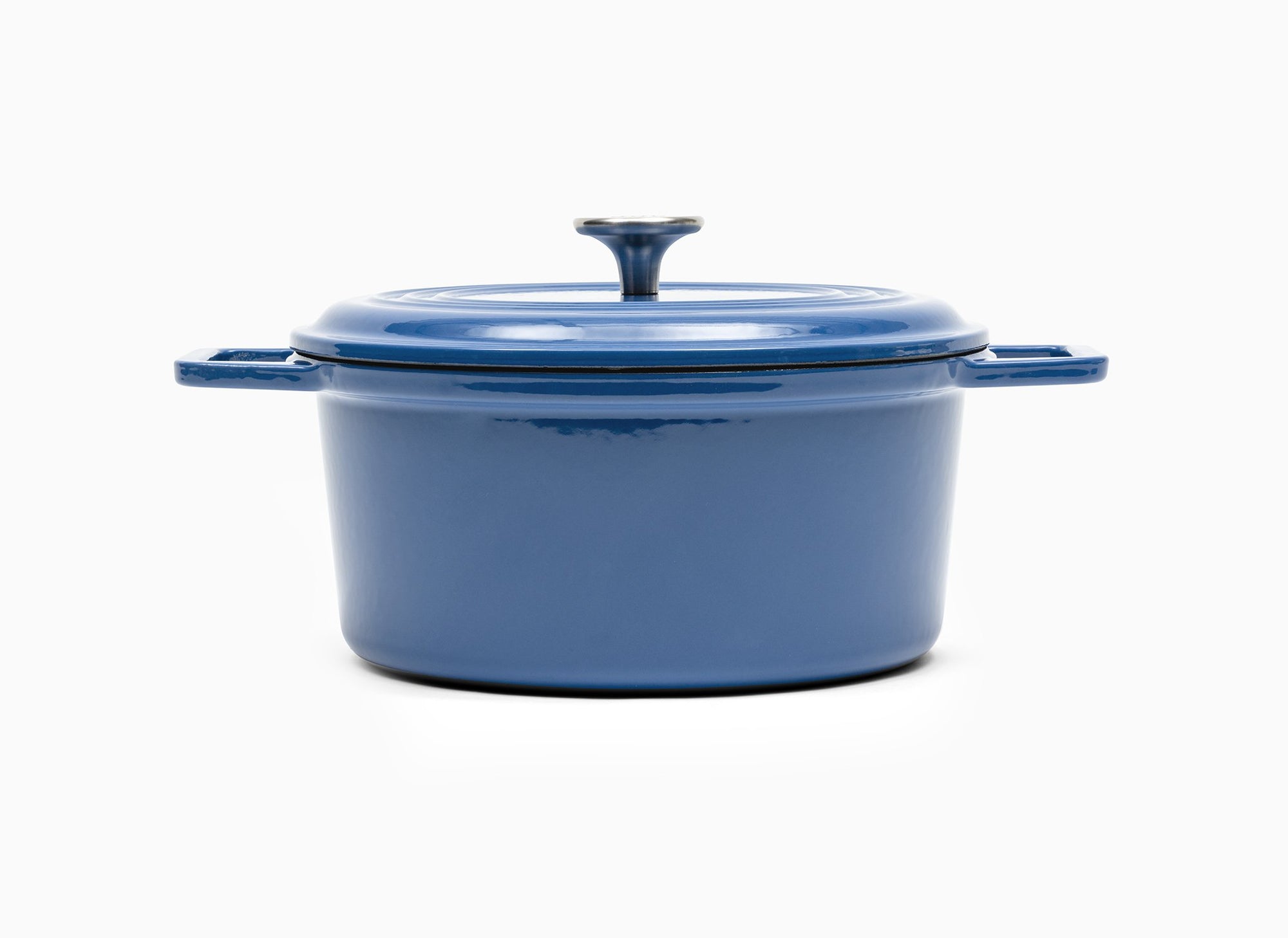 Blue Misen Dutch Oven covered by Traditional Lid with knob handle.
