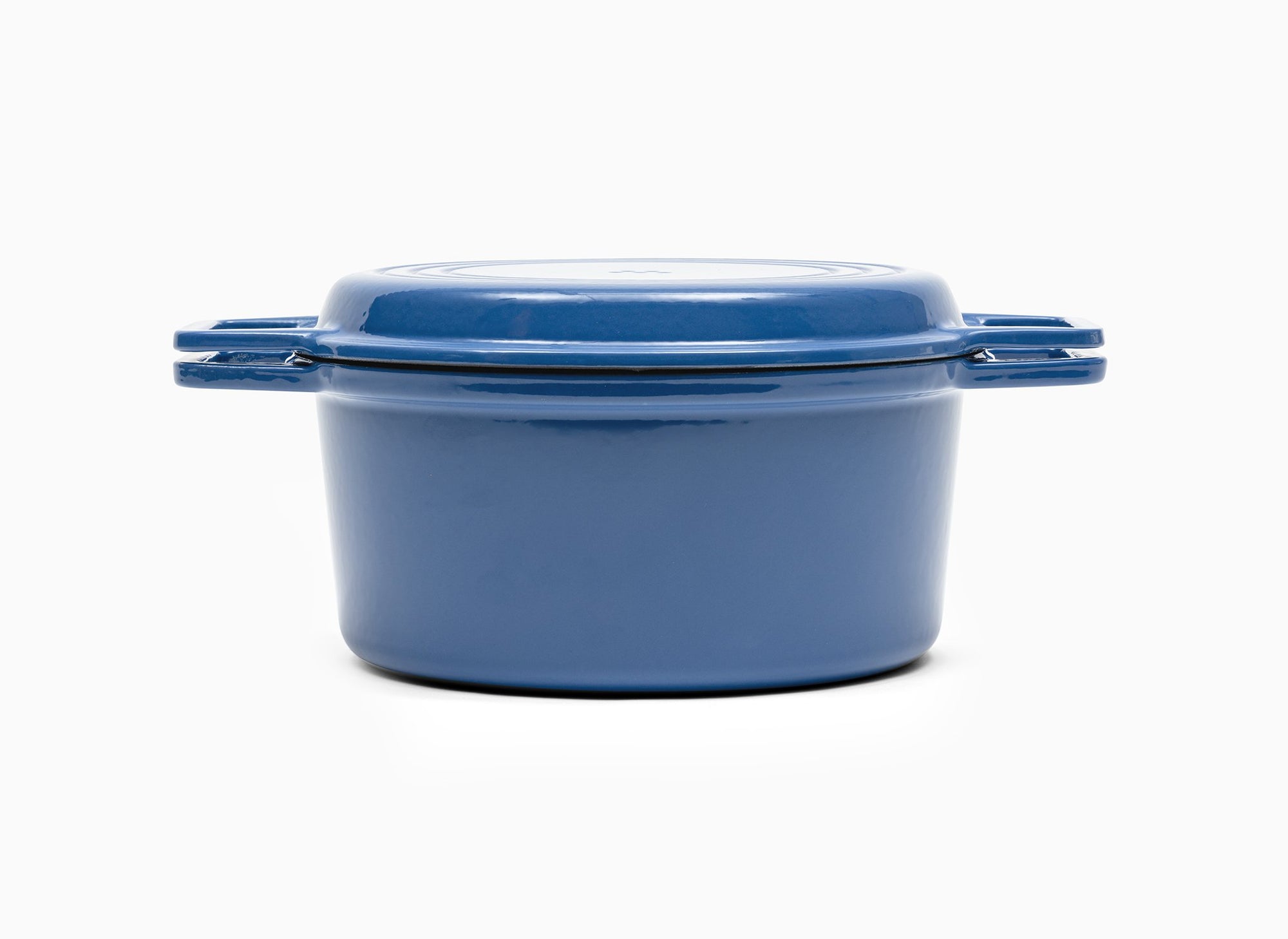 Blue Misen Dutch Oven covered by Grill Lid.