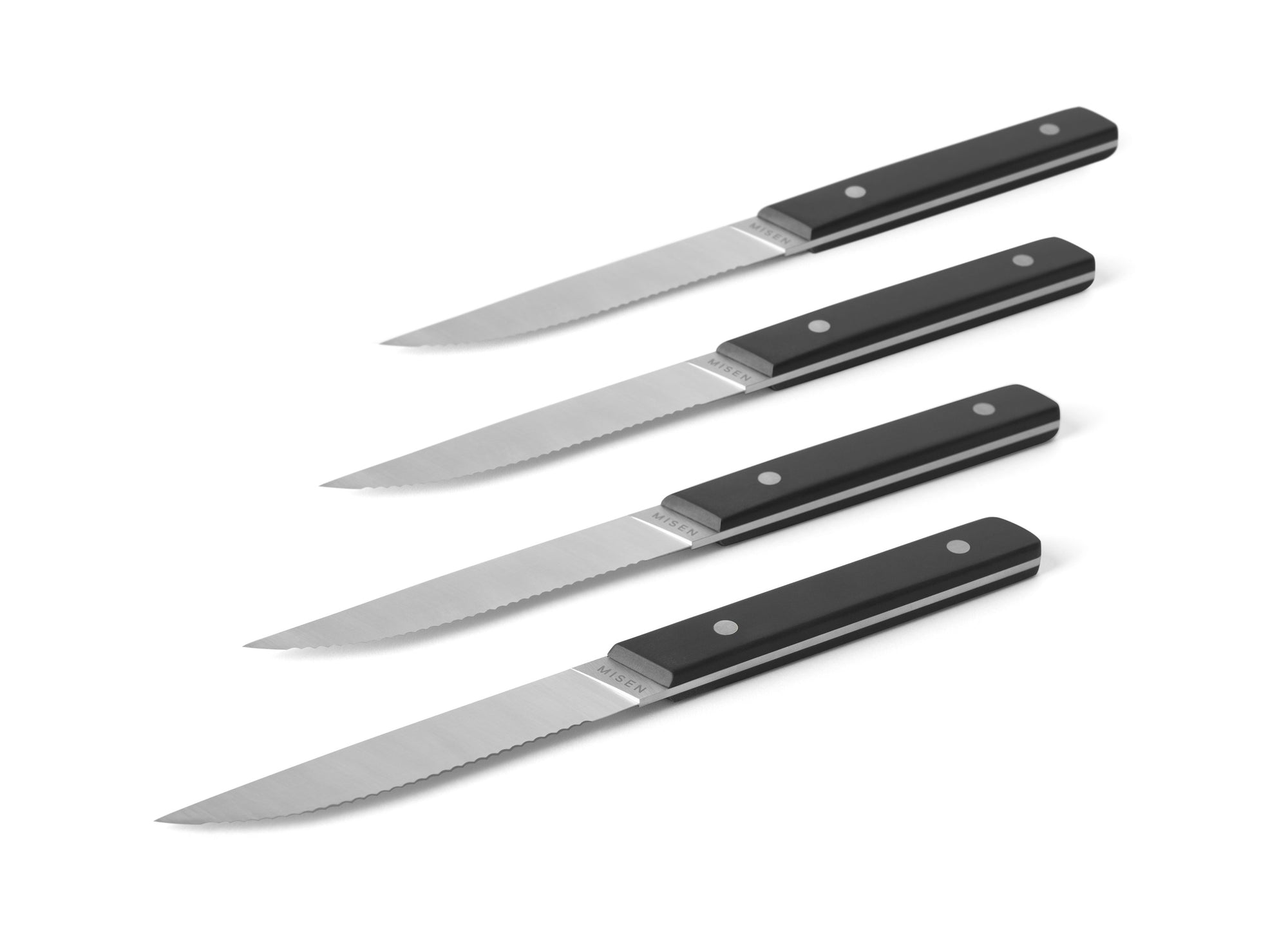 {{4pc-black}} Blade tip and spine of 4-Piece Misen Steak Knives in black