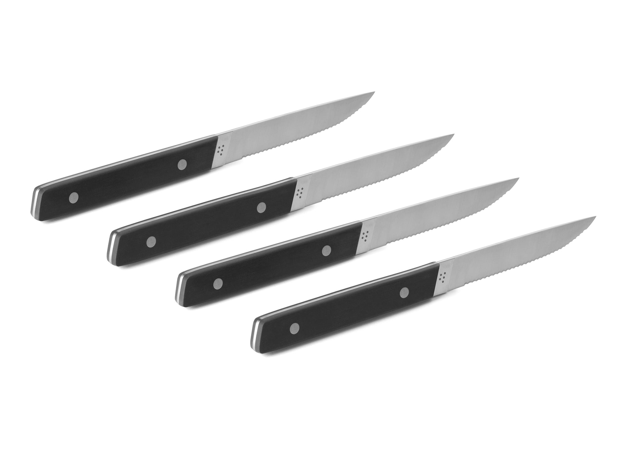 {{4pc-black}} The 4-Piece Misen Steak Knives in black are slim and comfortable to hold with a full tang handle.