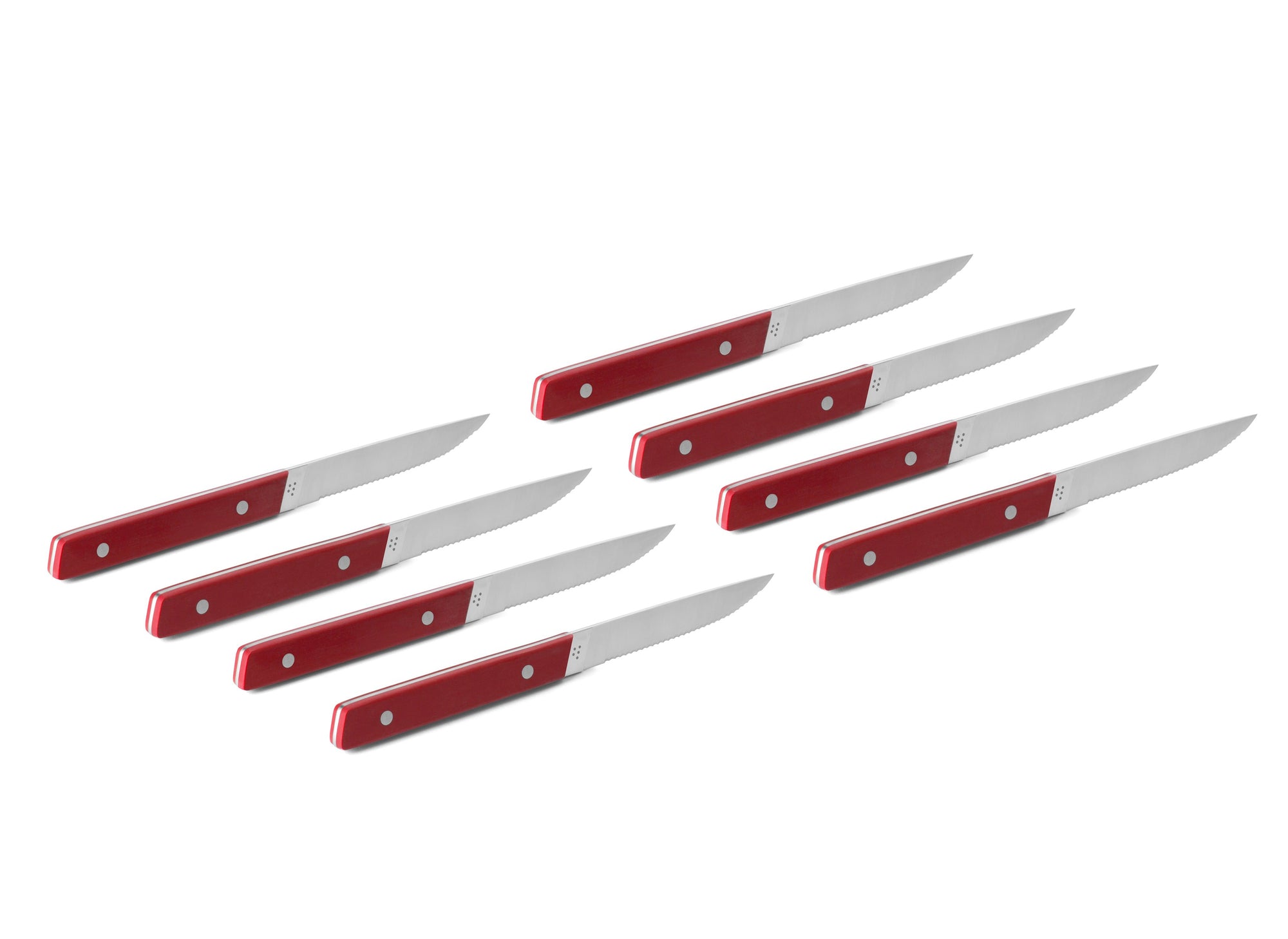 {{8pc-red}} The 8-Piece Misen Steak Knives in red are slim and comfortable to hold with a full tang handle.