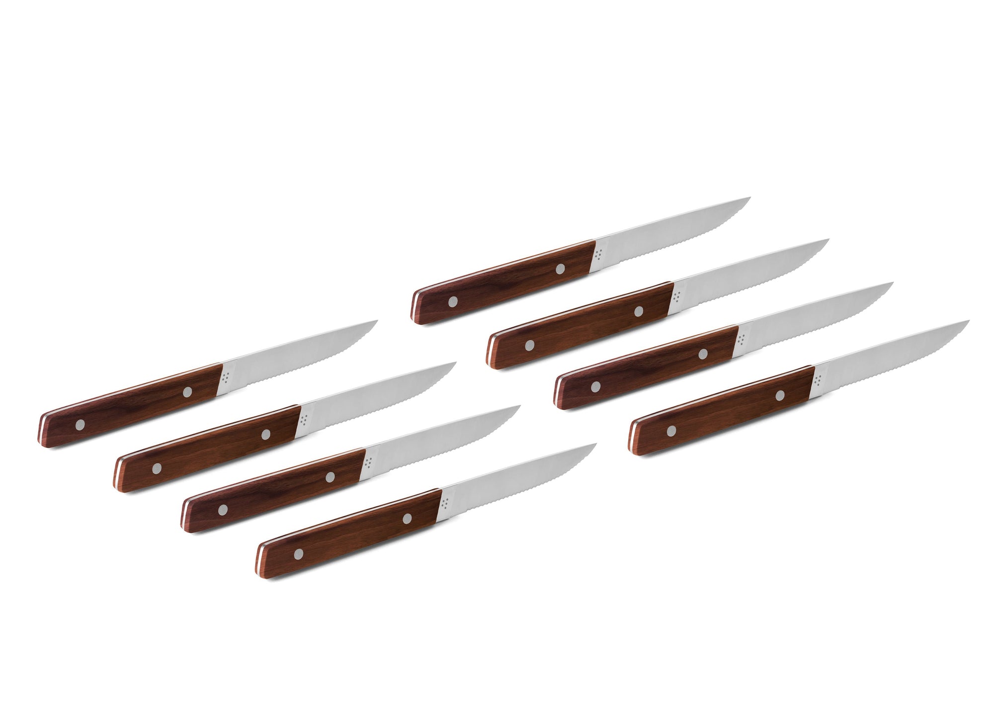 {{8pc-walnut}} The 8-Piece Misen Steak Knives in walnut are slim and comfortable to hold with a full tang handle.