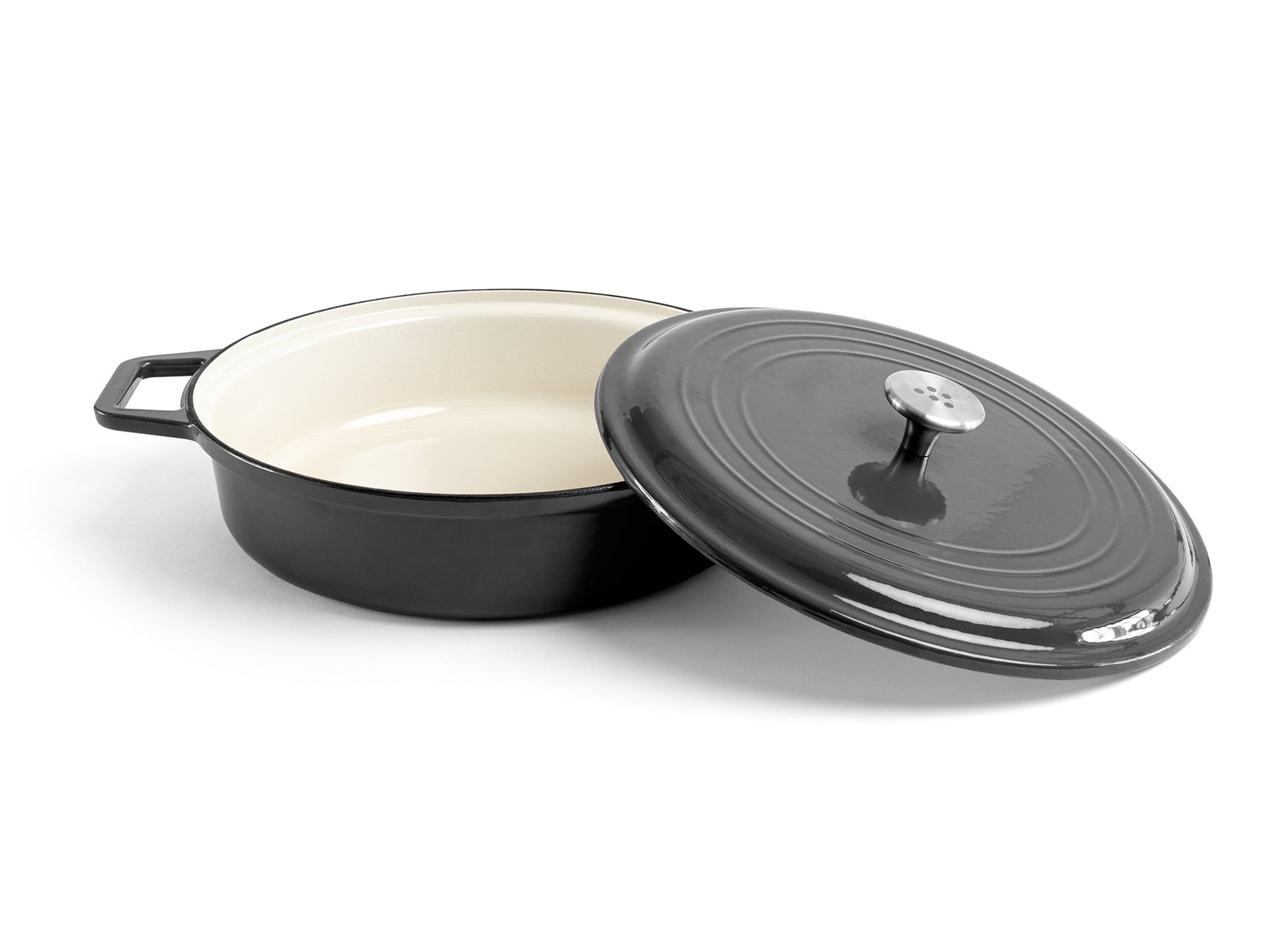 {{black}} A black Misen Enameled Cast Iron Braiser with knob-handle lid removed and resting against the pan’s side.