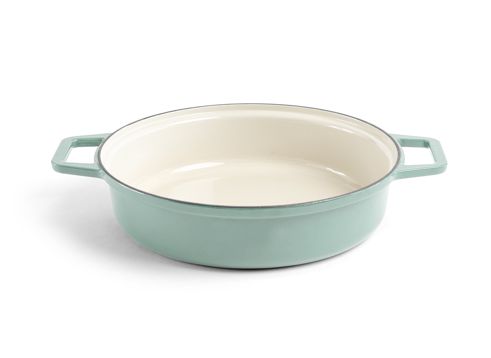 {{green}} A green Misen Enameled Cast Iron Braiser with lid removed, revealing cream-white interior.