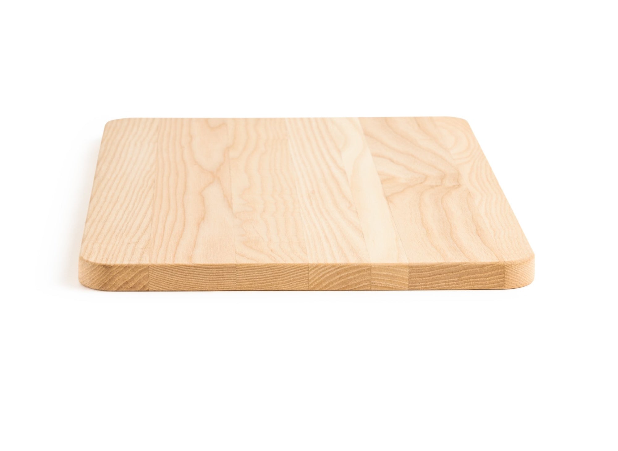 {{medium,2-piece-set}} A Medium Misen Wood Cutting Board seen from its shorter side.