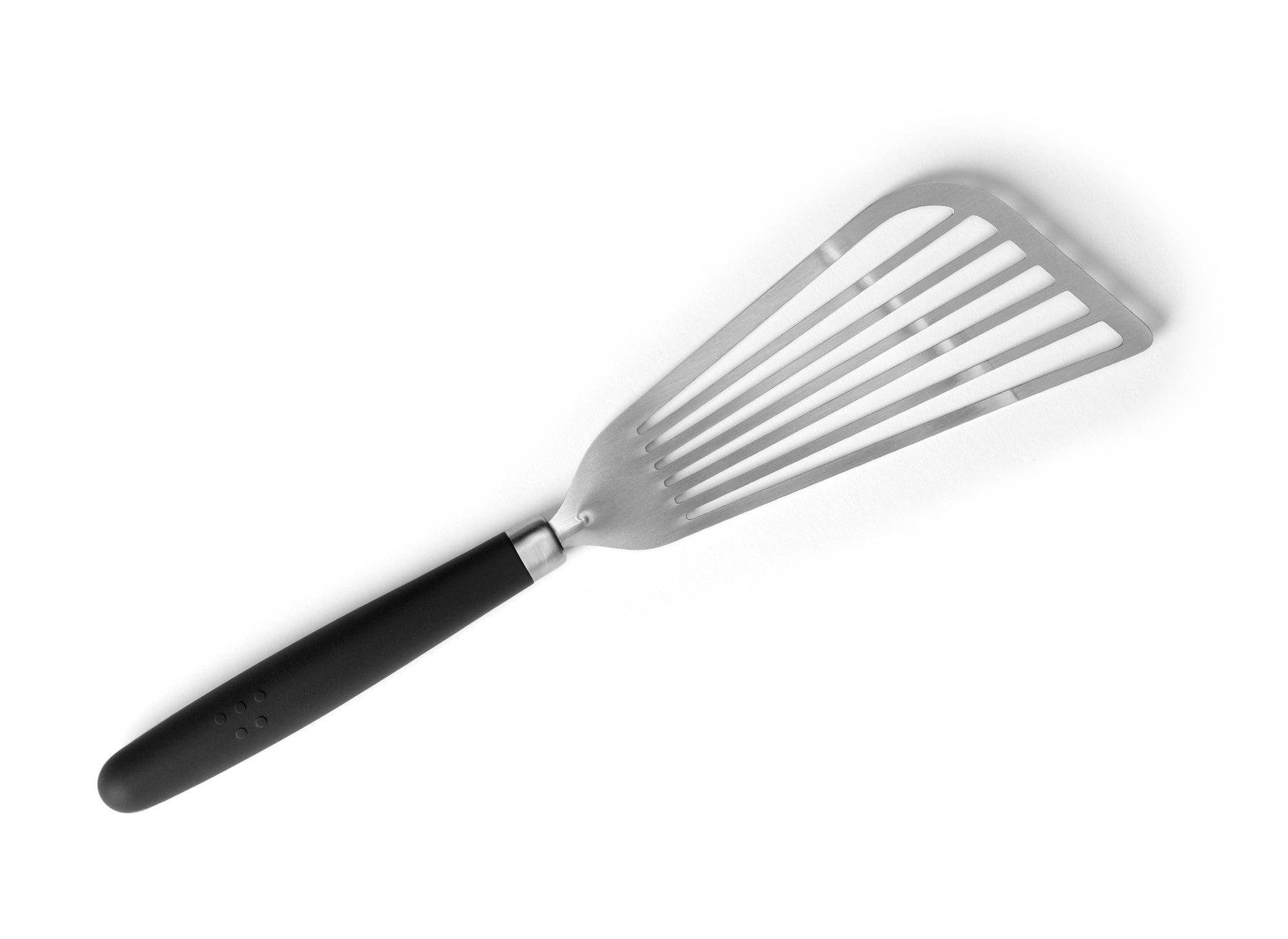 {{stainless-steel-black}} A Black Misen Metal Fish Spatula on a white background. Shows a slotted and flared metal head attached to a silicone handle.