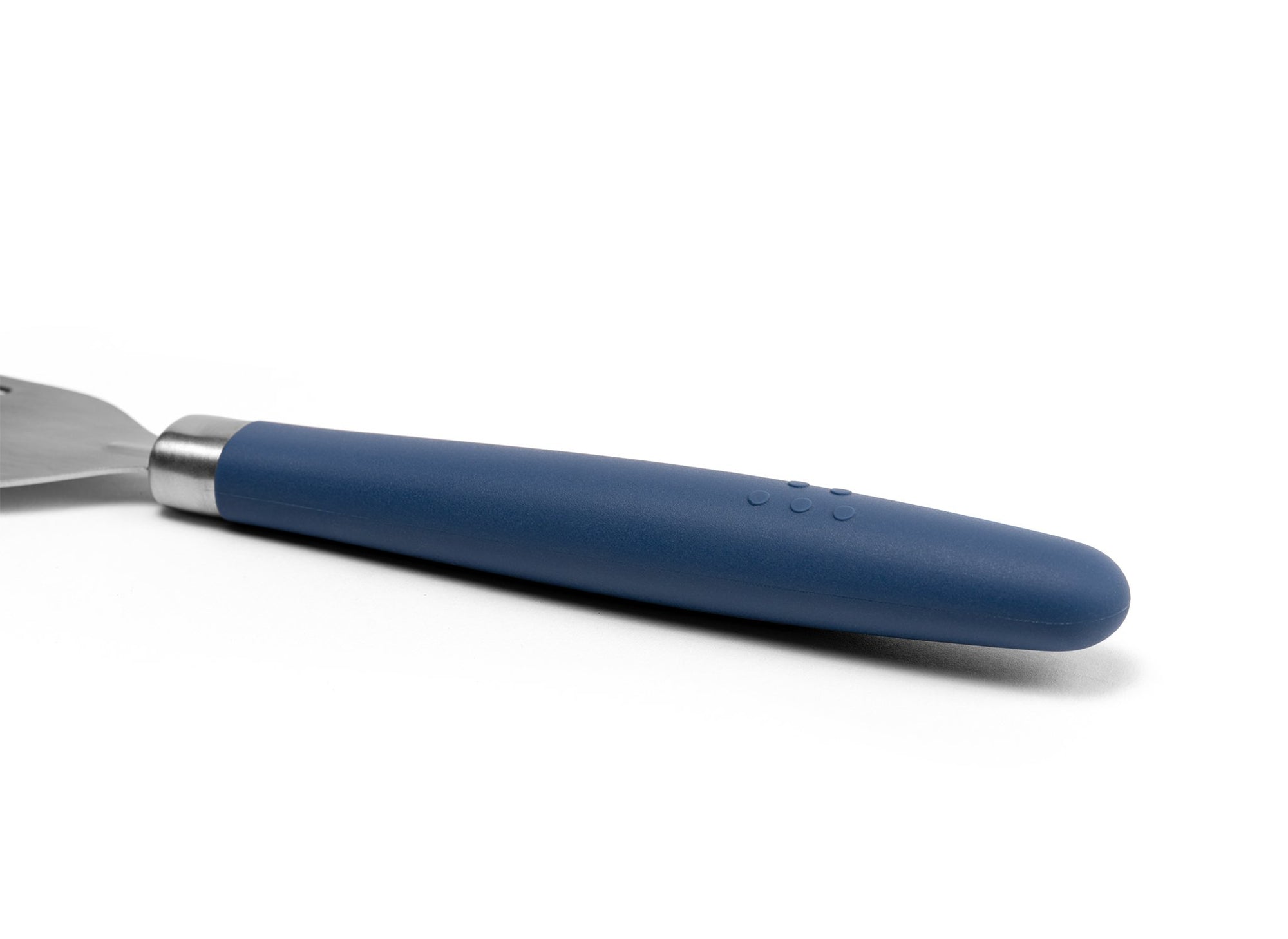 {{stainless-steel-blue}} A close view of the Blue Misen Metal Fish Spatula’s thick silicone handle on a white background.