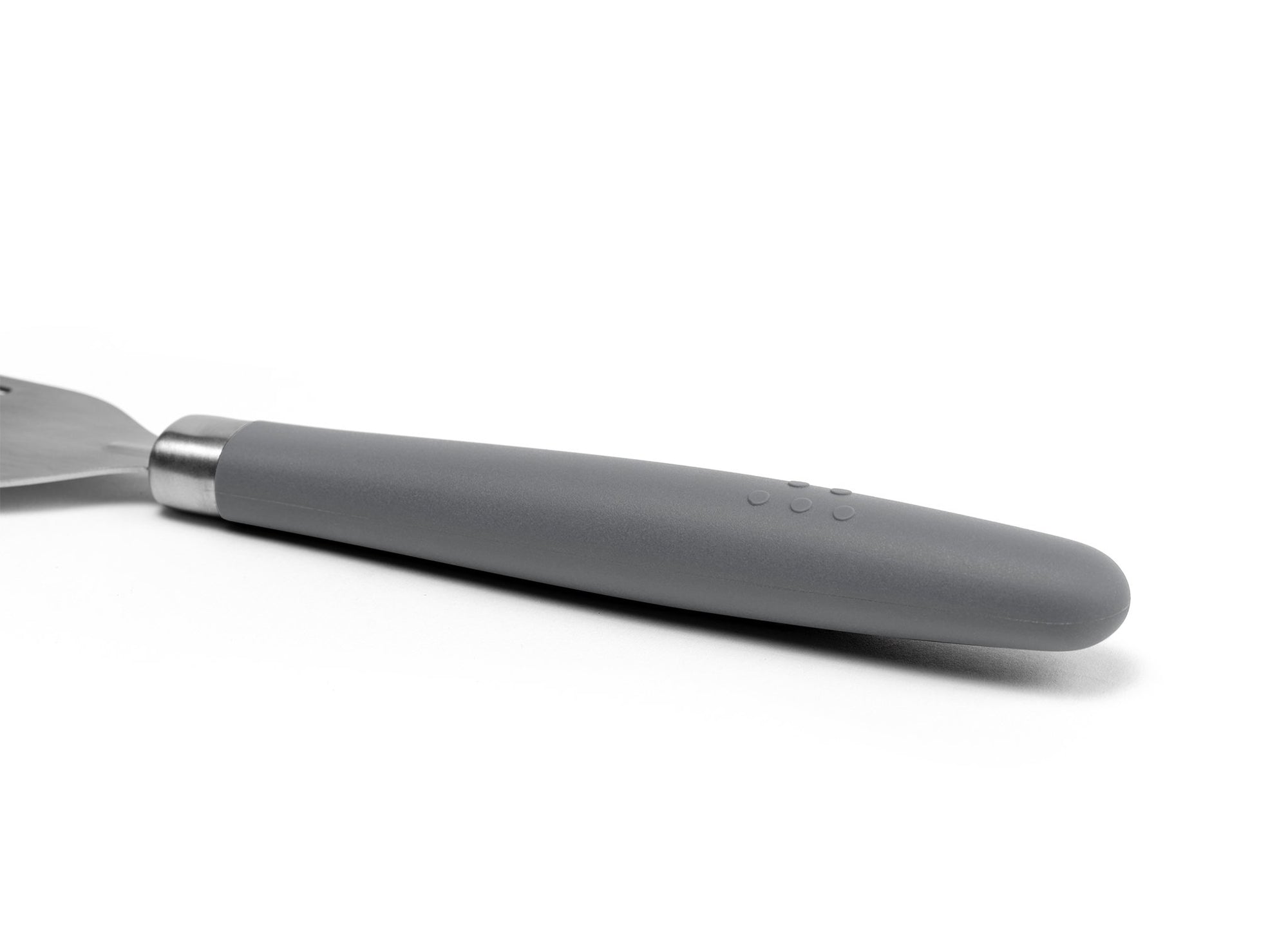 {{stainless-steel-gray}} A close view of the Grey Misen Metal Fish Spatula’s thick silicone handle on a white background.