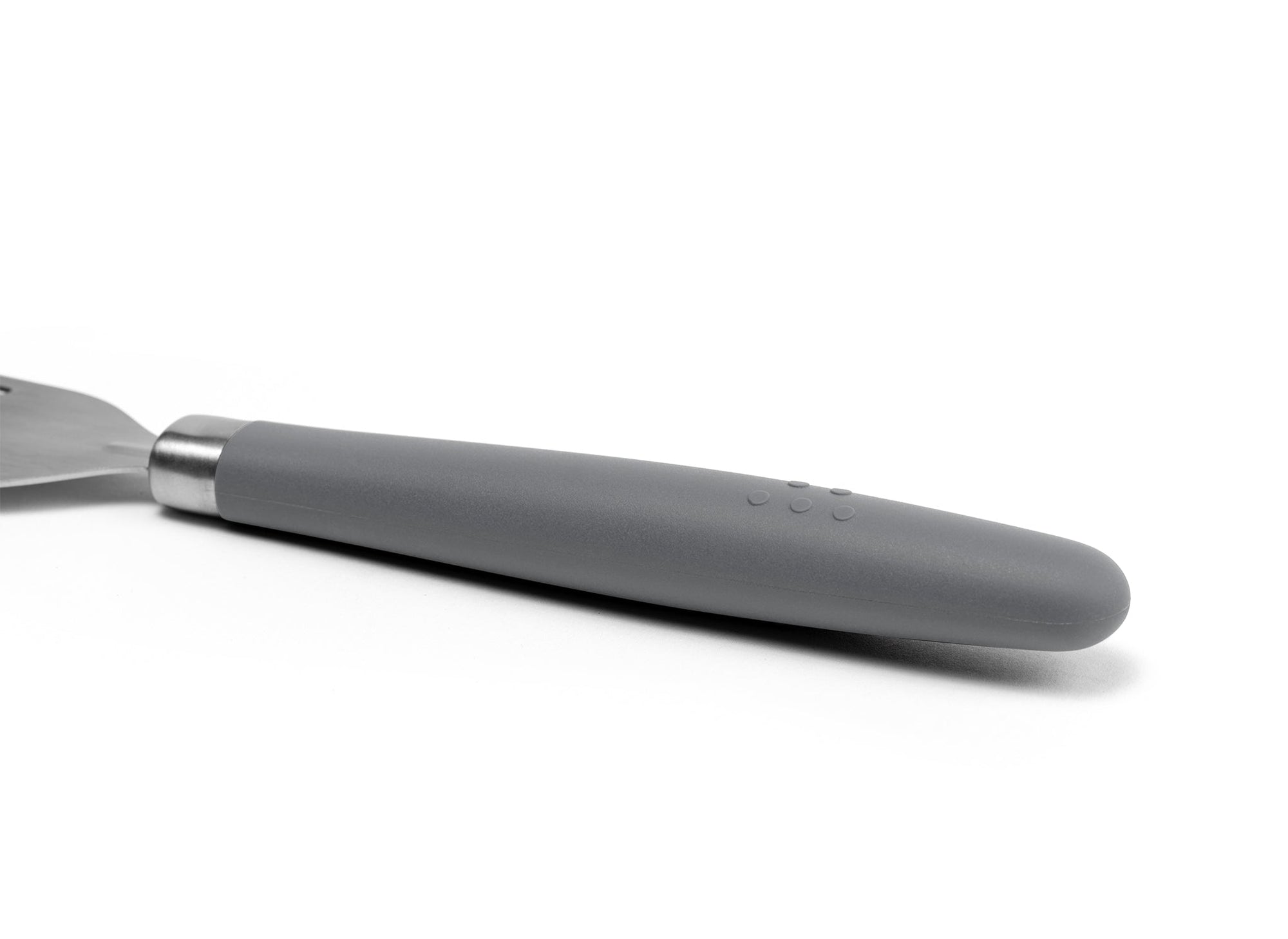 {{stainless-steel-gray}} A close view of the Grey Misen Metal Fish Spatula’s thick silicone handle on a white background.