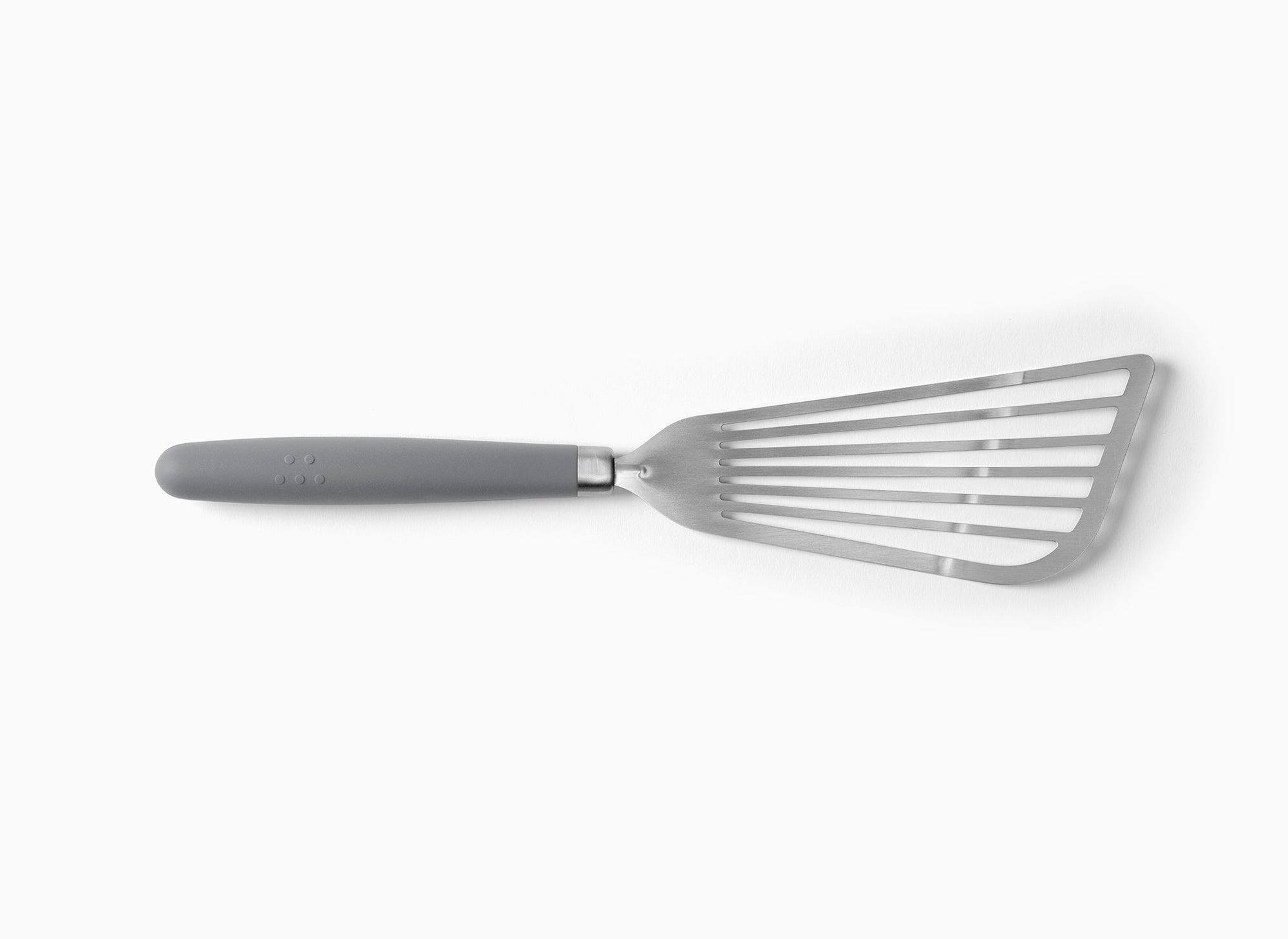 A Grey Misen Metal Fish Spatula on a white background. Shows a slotted and flared metal head attached to a silicone handle.