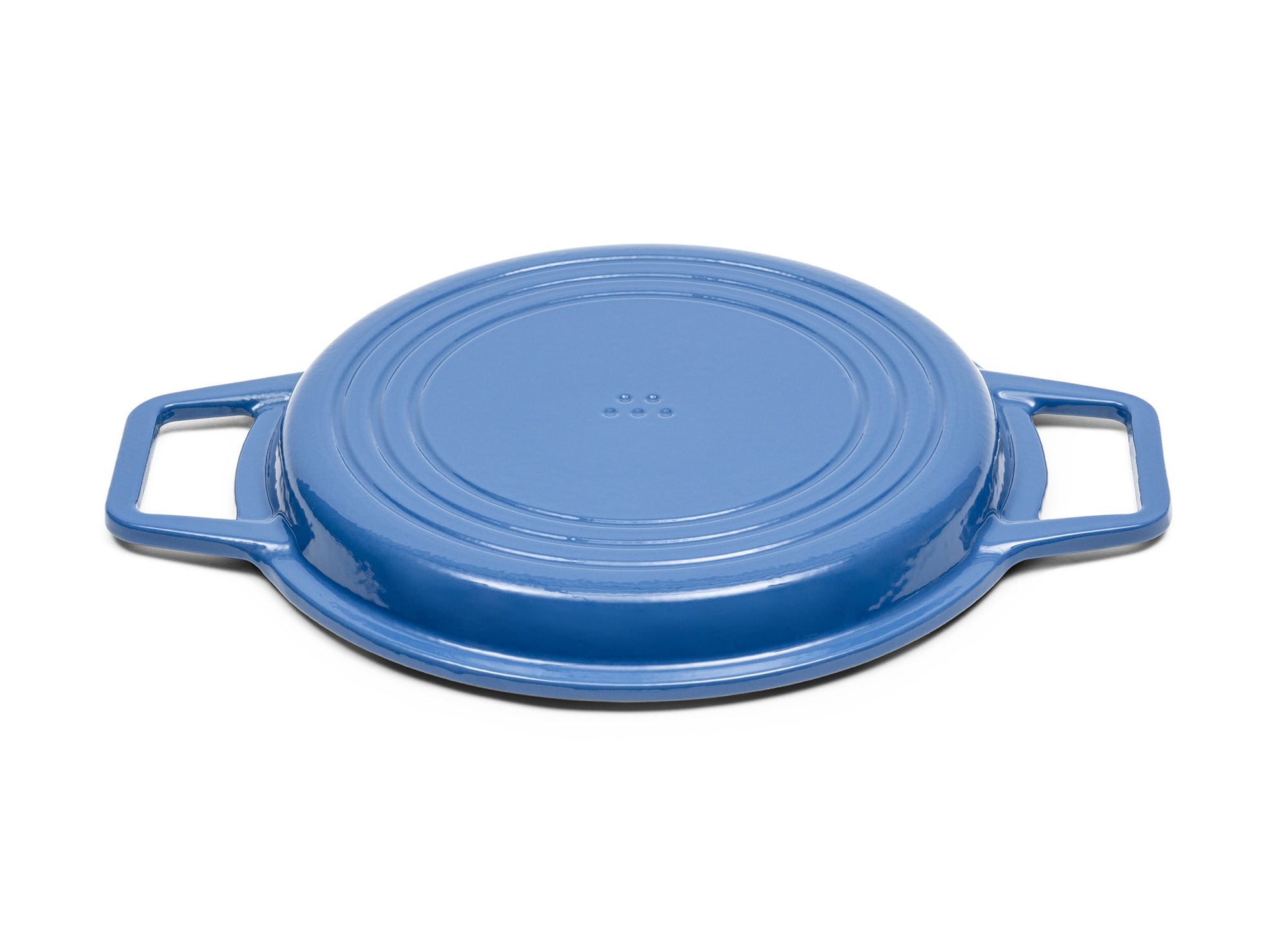 {{blue,7-qt-blue,9-qt-blue}} A Blue Misen Enameled Cast Iron Grill Pan face-down, showing a Misen logo on the base.