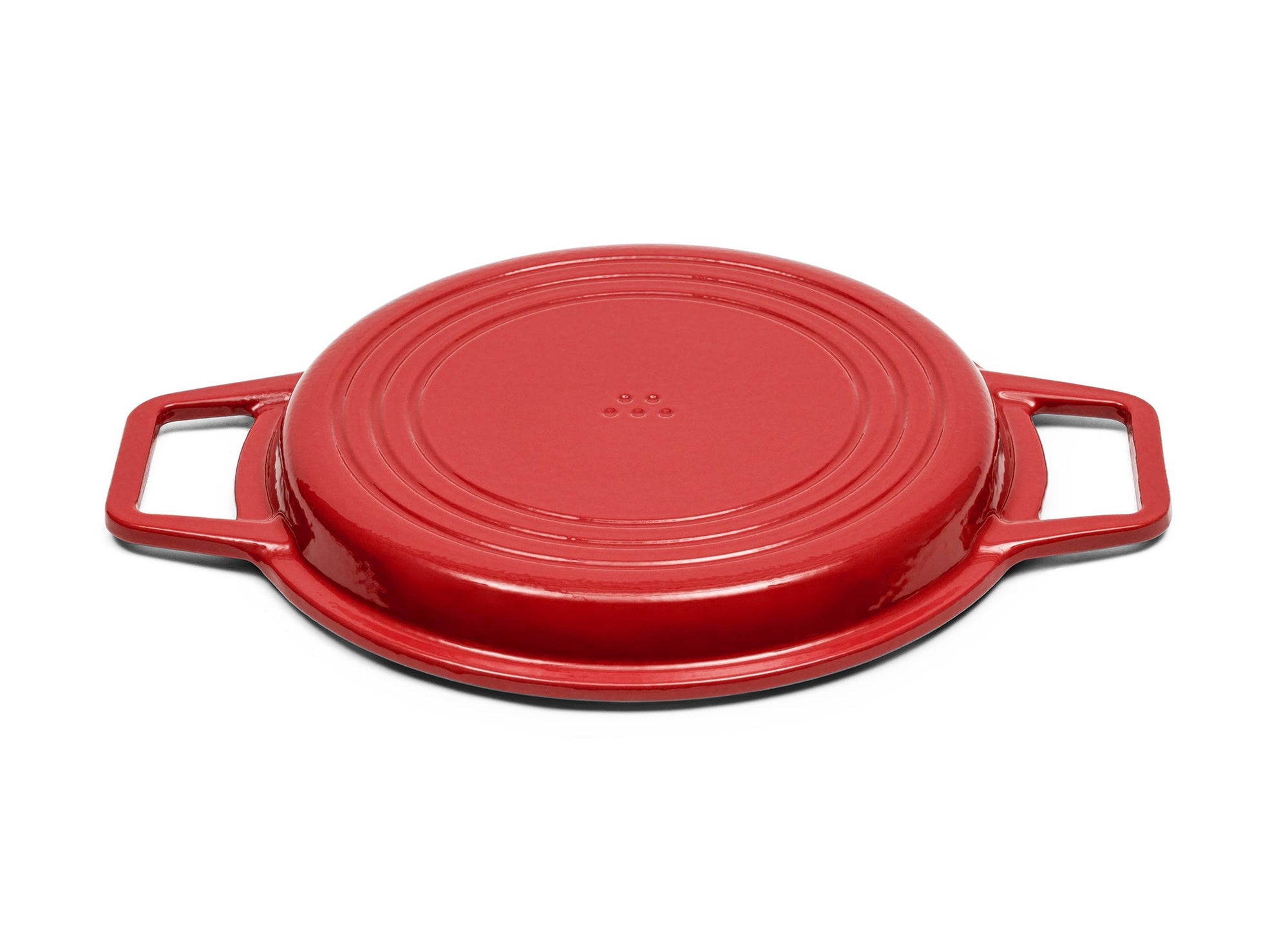 {{red,7-qt-red,9-qt-red}} A Red Misen Enameled Cast Iron Grill Pan face-down, showing a Misen logo on the base.