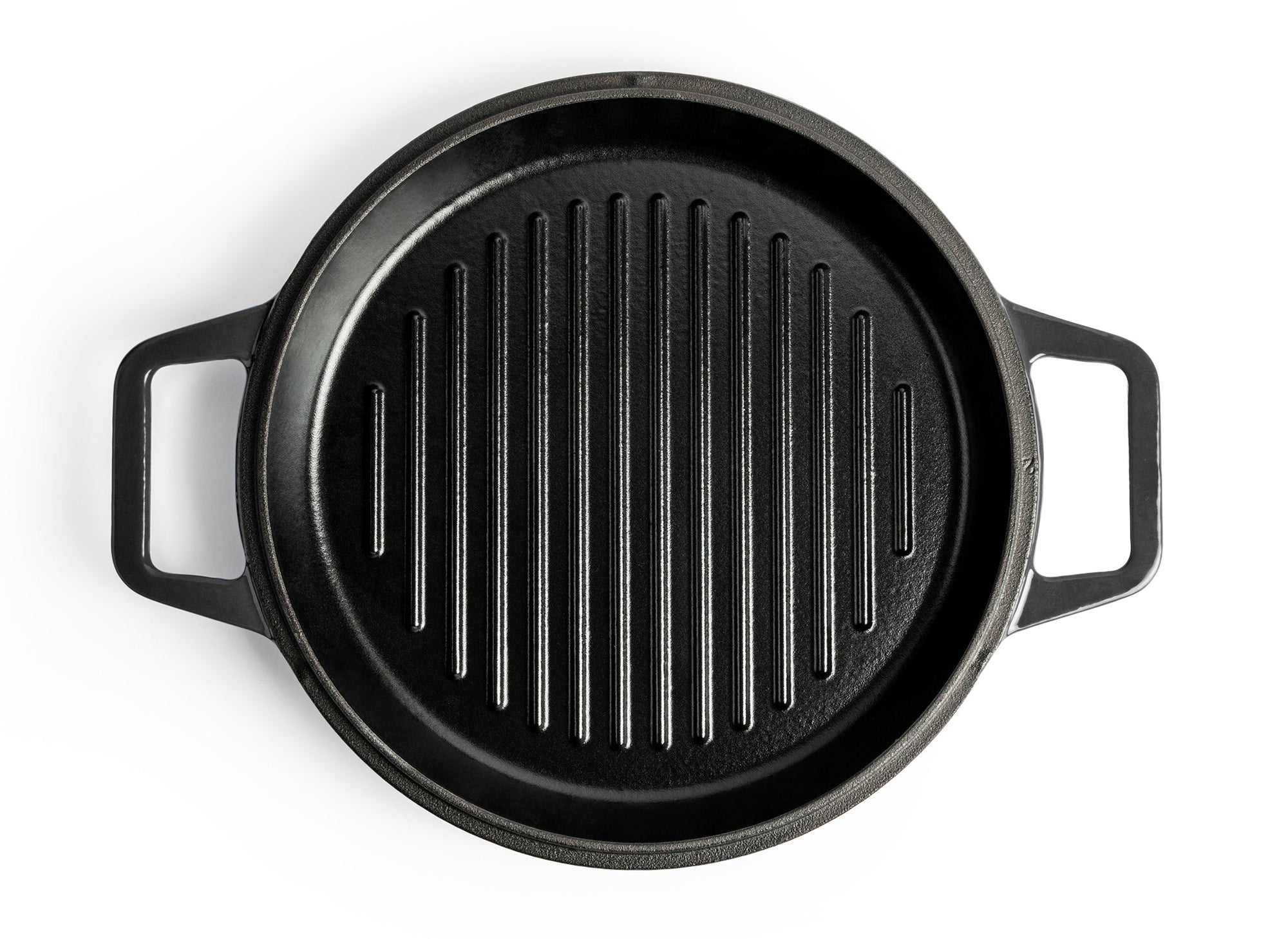 {{black,7-qt-black,9-qt-black}} A hand lifts up a Black Misen Enameled Cast Iron Grill pan by one of its two side handles.