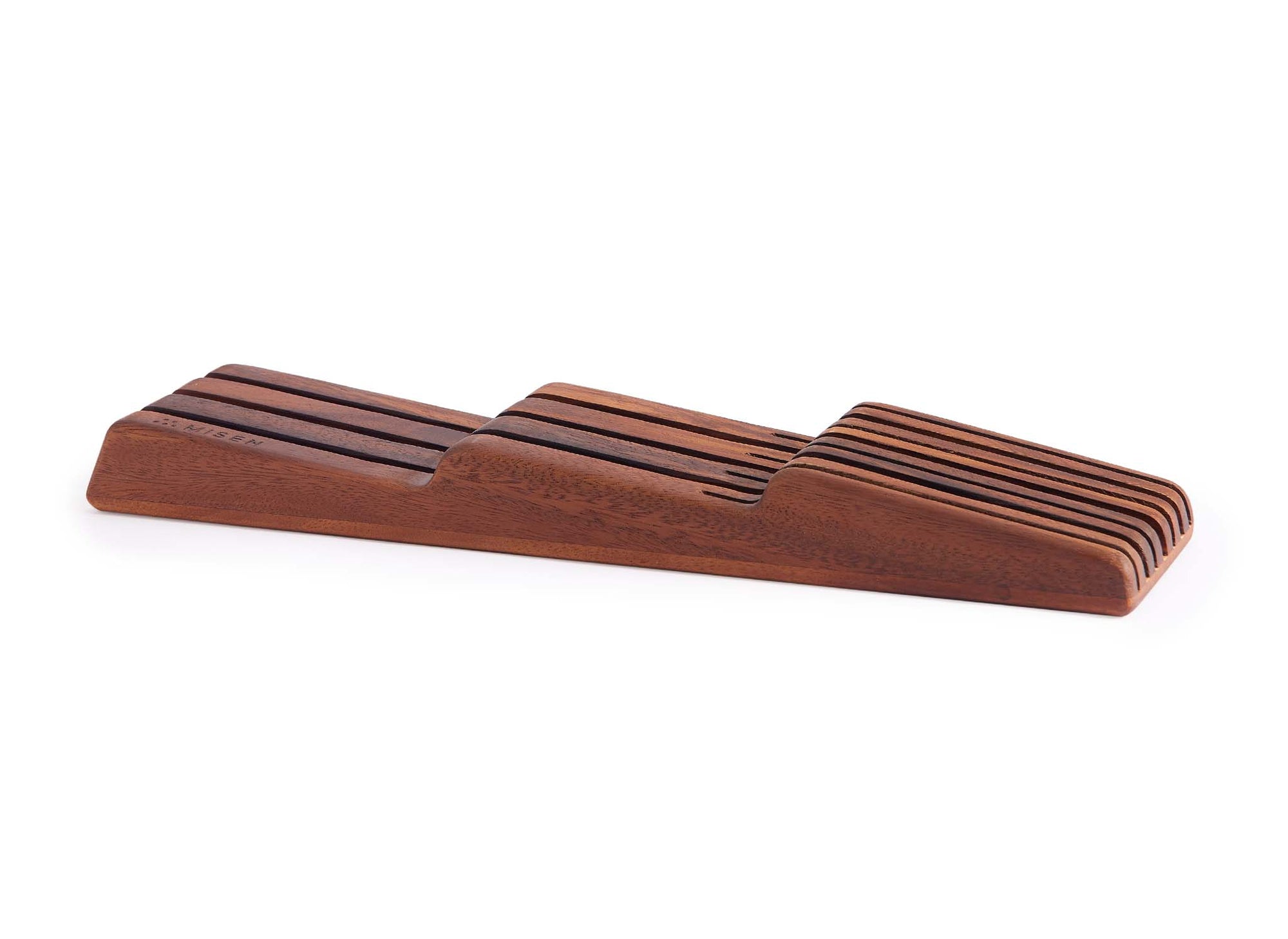 {{walnut}} Empty Misen In-Drawer Knife Storage made from dark Walnut wood, seen from a slight angle.