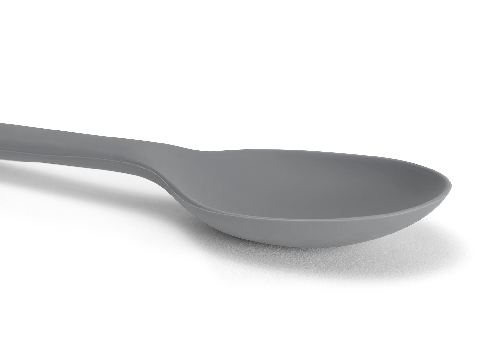 {{gray}} A Grey Misen Mixing Spoon seen from above on a white background.