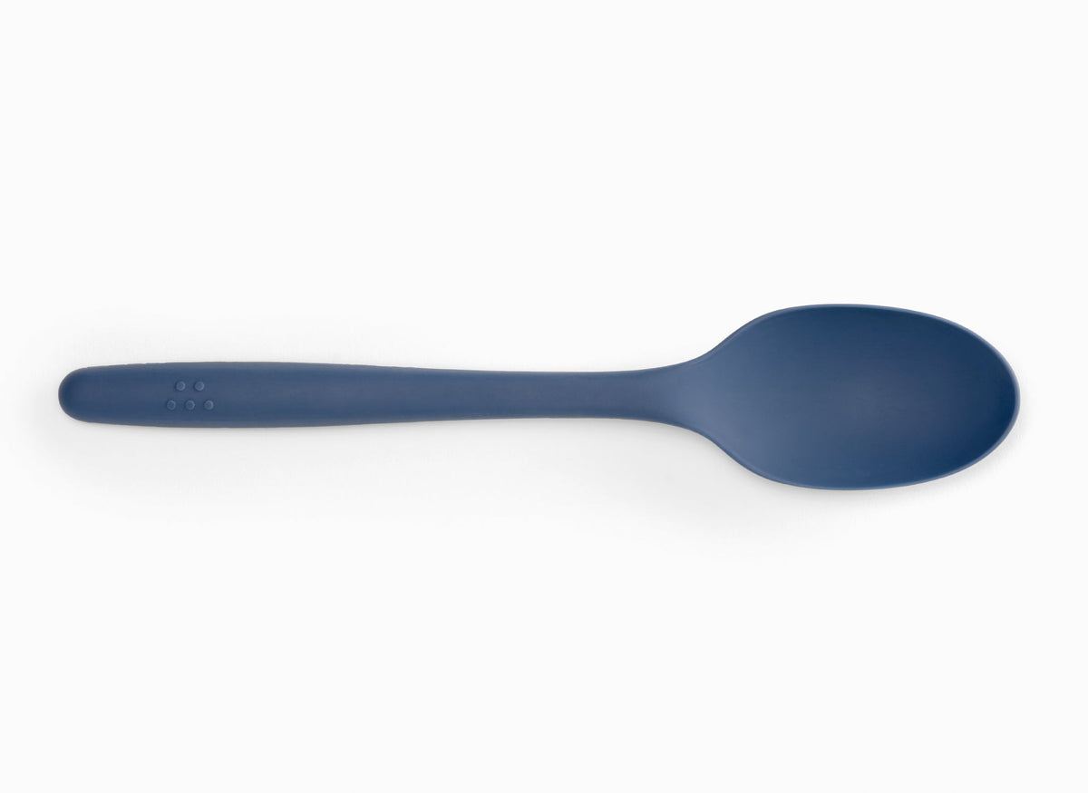 A Blue Misen Mixing Spoon seen from above on a white background.