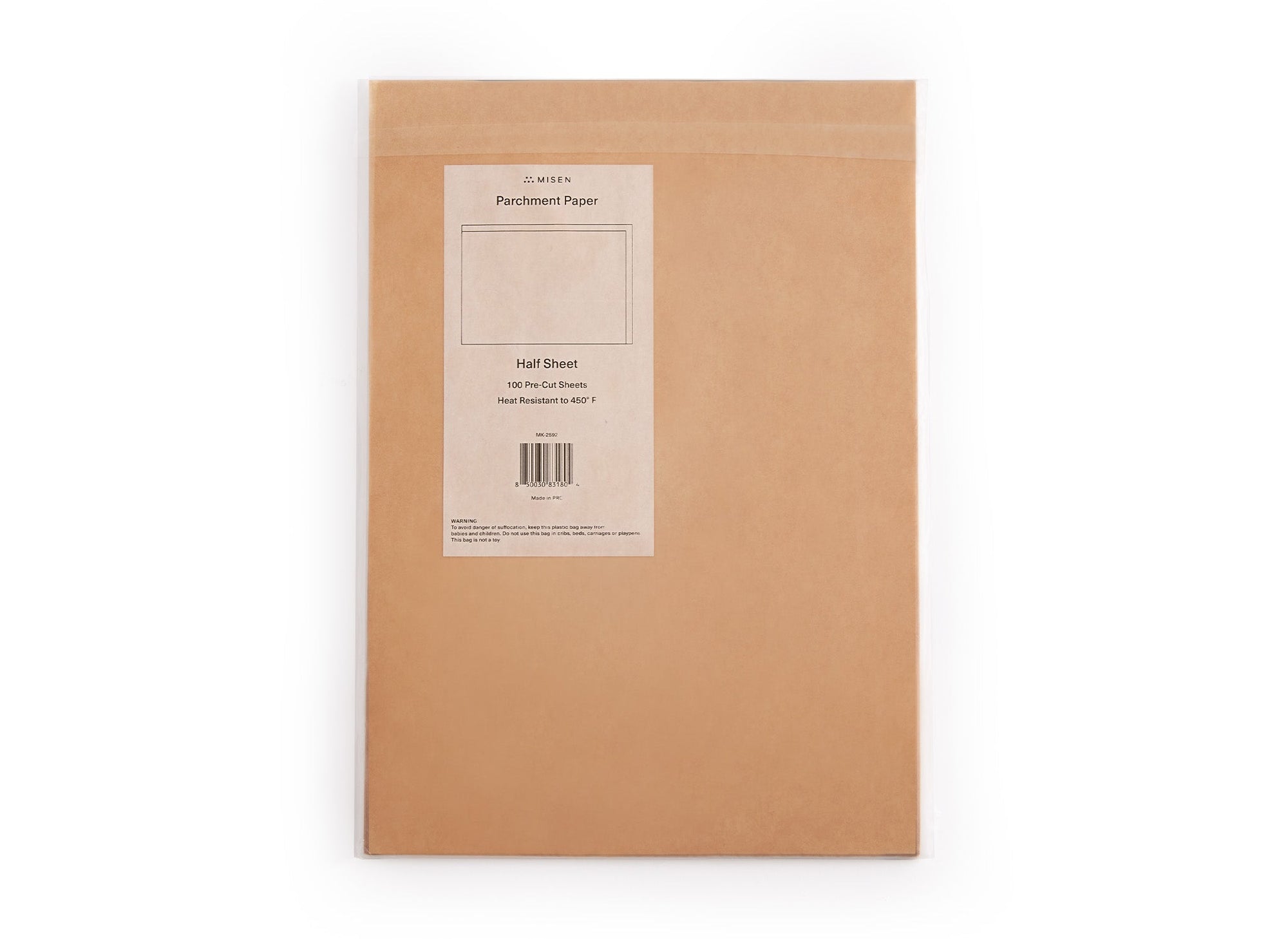 {{oven}} A bird’s eye view of a package of Misen Half-Sheet Parchment Paper, on a white background.