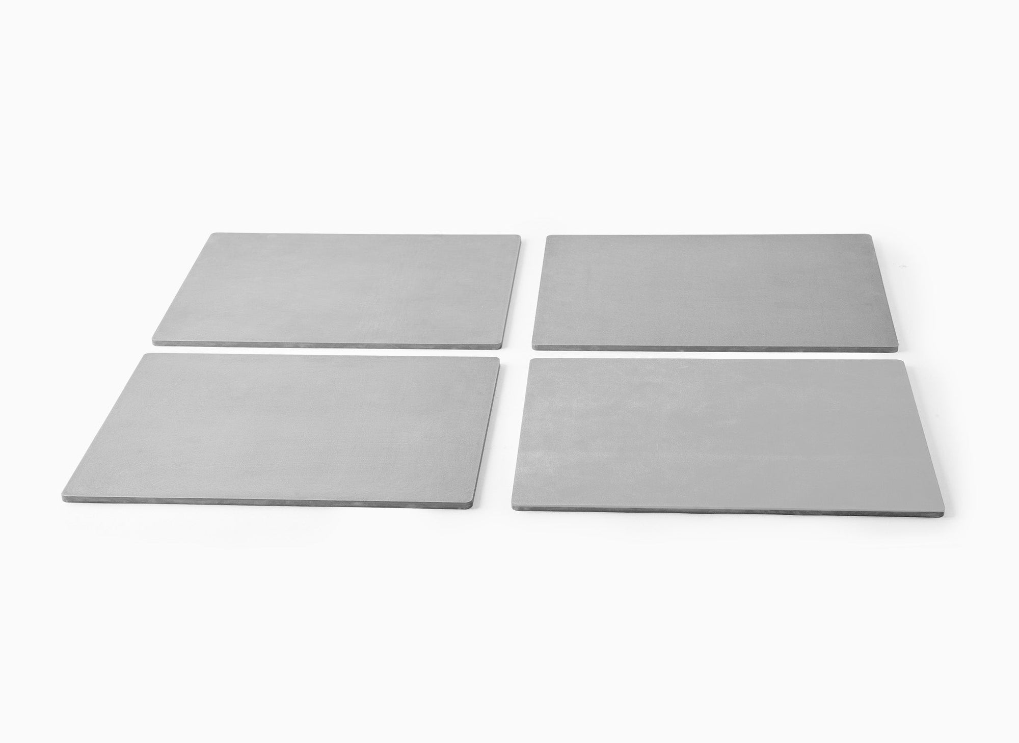 A set of four Misen Oven Steels, arranged in a rectangle.