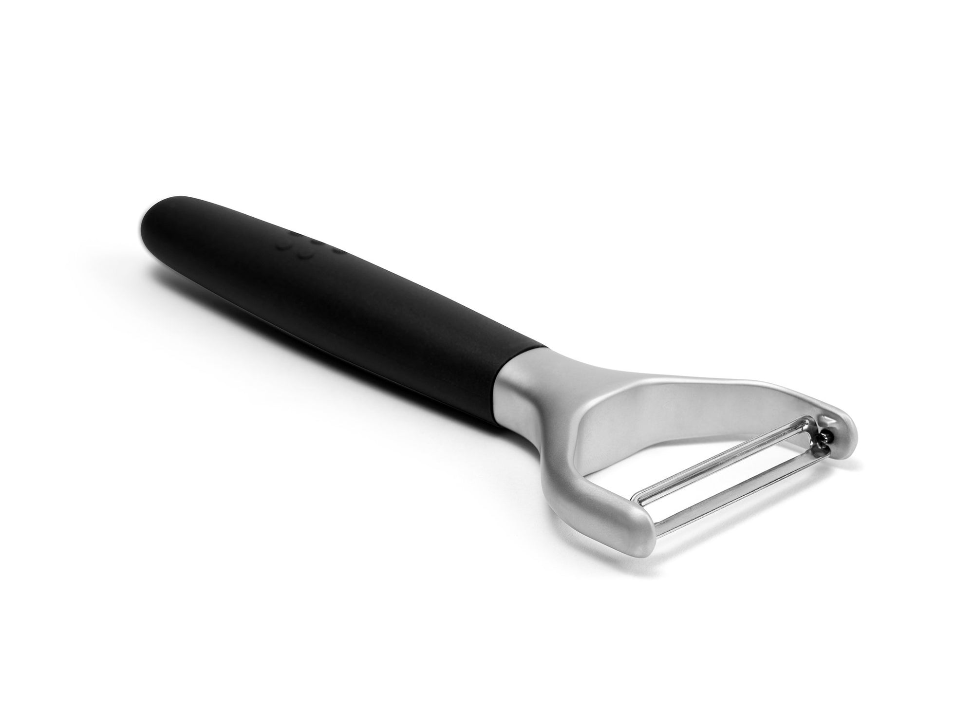 {{black}} A Black Misen Peeler with silicone handle and metal Y-shaped head viewed from the side on a white background.