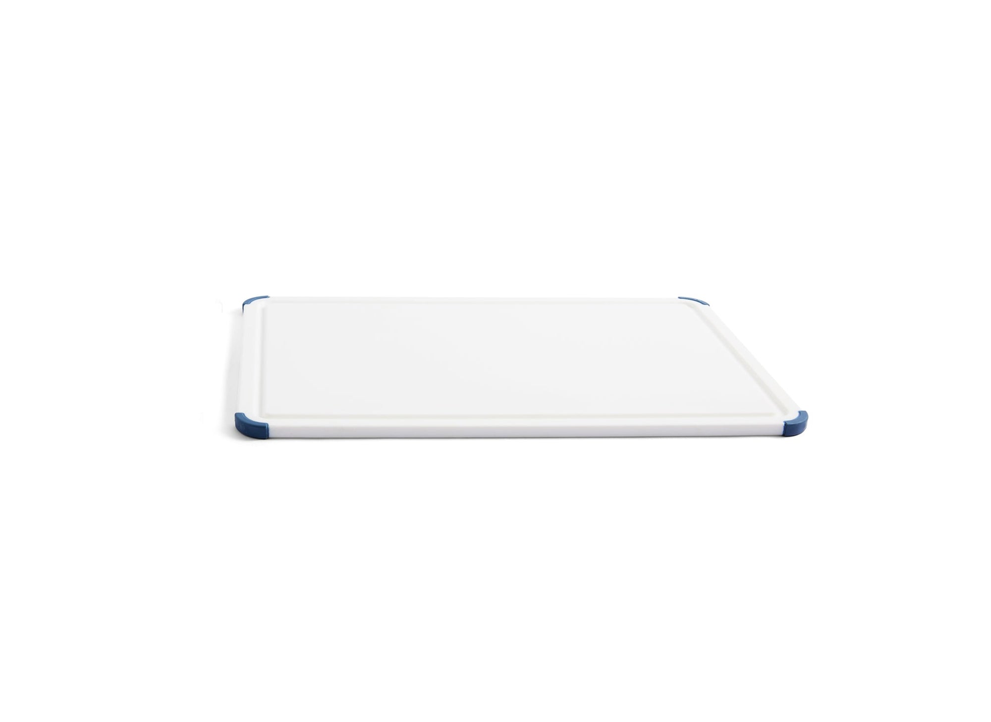 {{large}} A large Misen Plastic Cutting Board seen from an angle, with juice groove and blue corner grips visible.