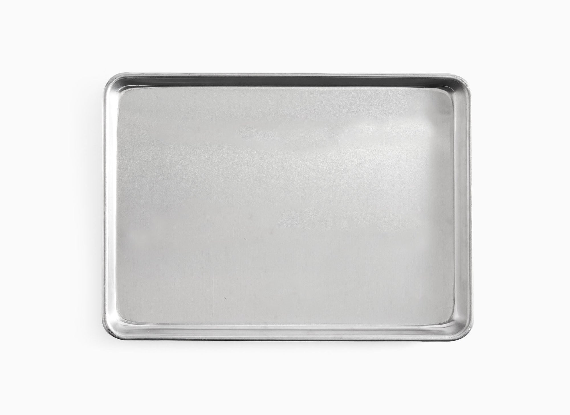 A bird’s eye view of one Misen Half Sheet Pan on a white background. 
