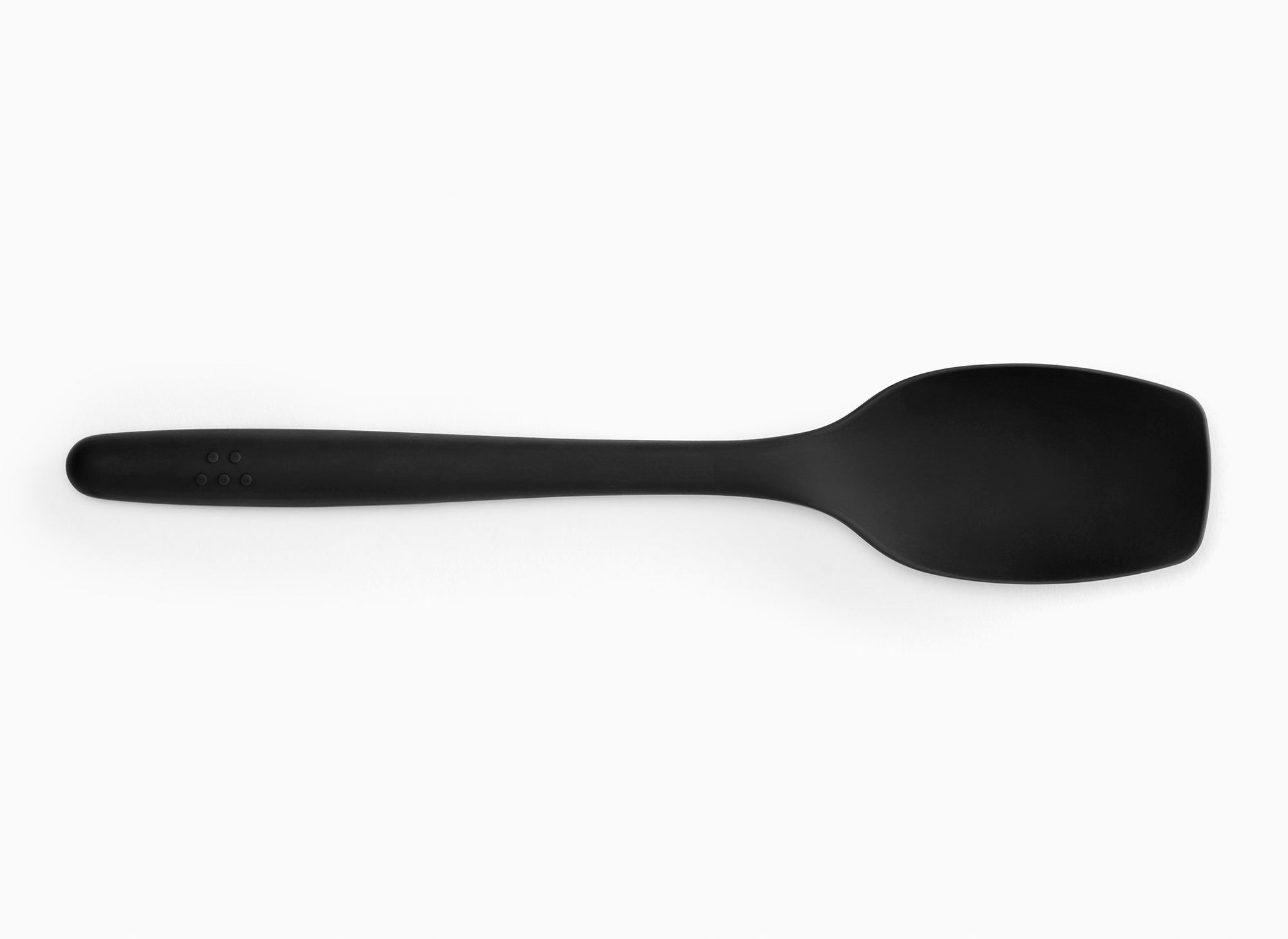 Black Misen Spoontula seen from above on a white background. A curved spoon-like head with rounded corner edges and a long handle.