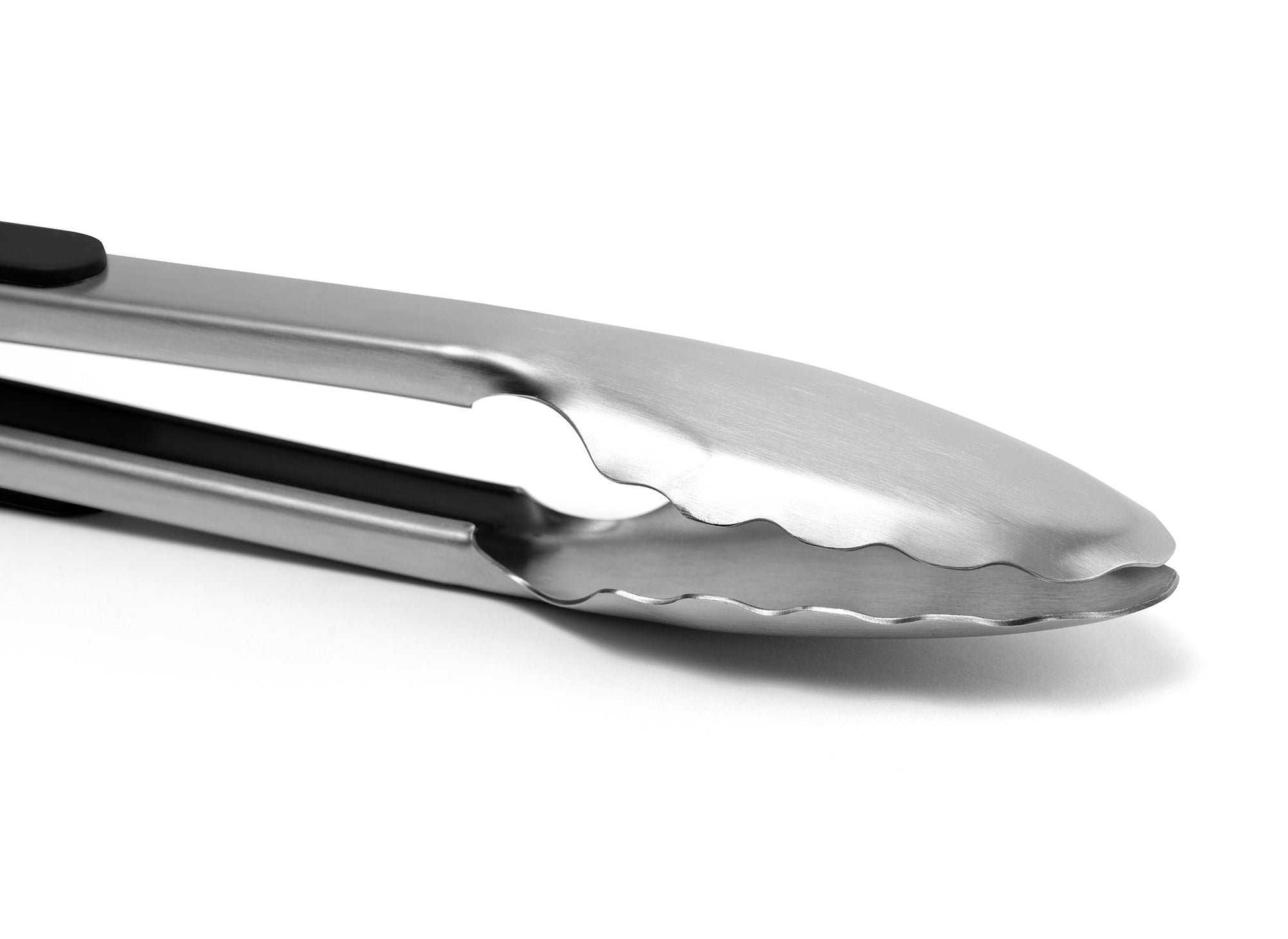 {{stainless-steel-black}} Black Misen Metal Tongs on a white background, showing bare metal head with scalloped edges in a locked position.