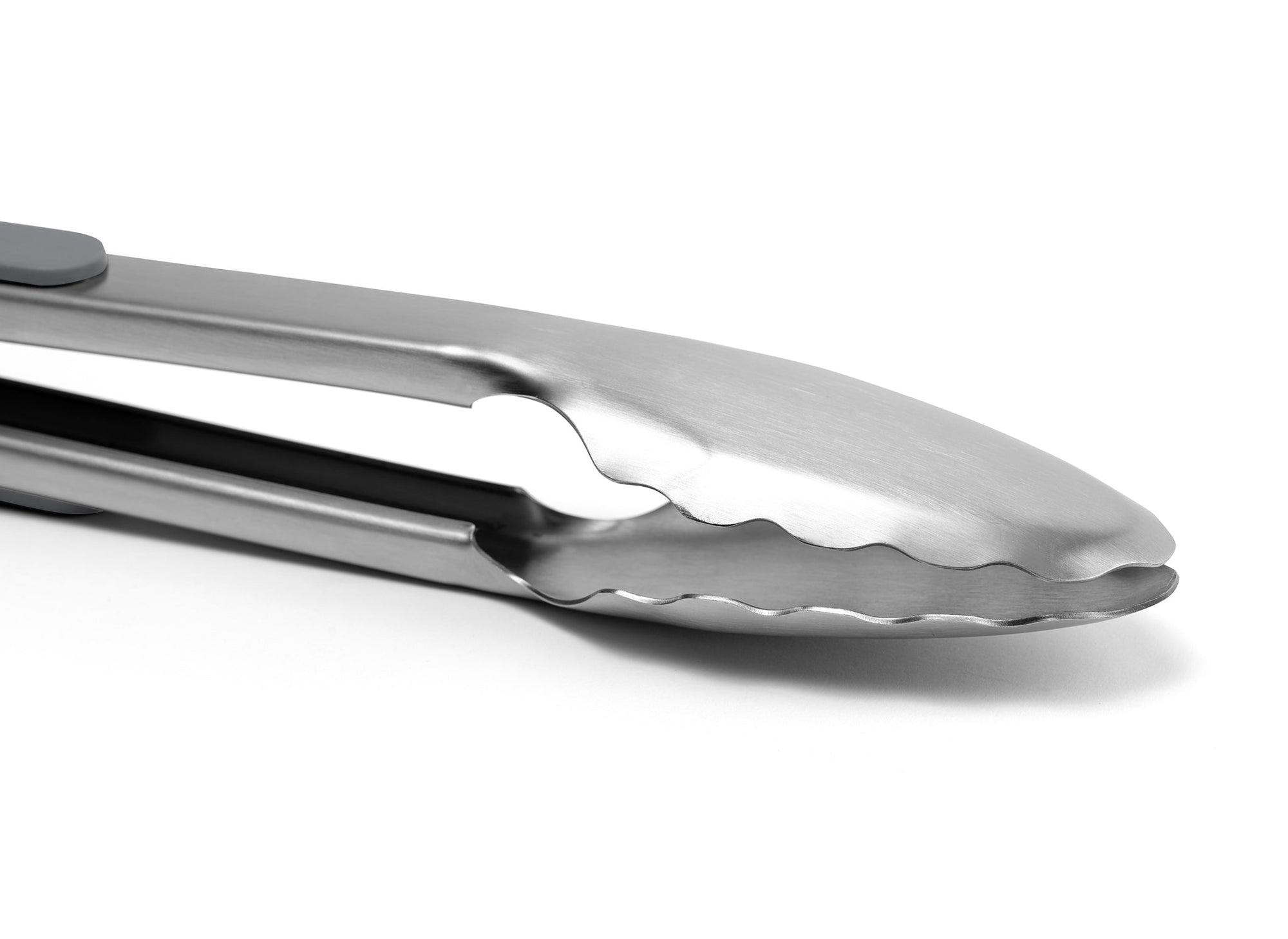 {{stainless-steel-gray}} Grey Misen Metal Tongs on a white background, showing bare metal head with scalloped edges in a locked position.