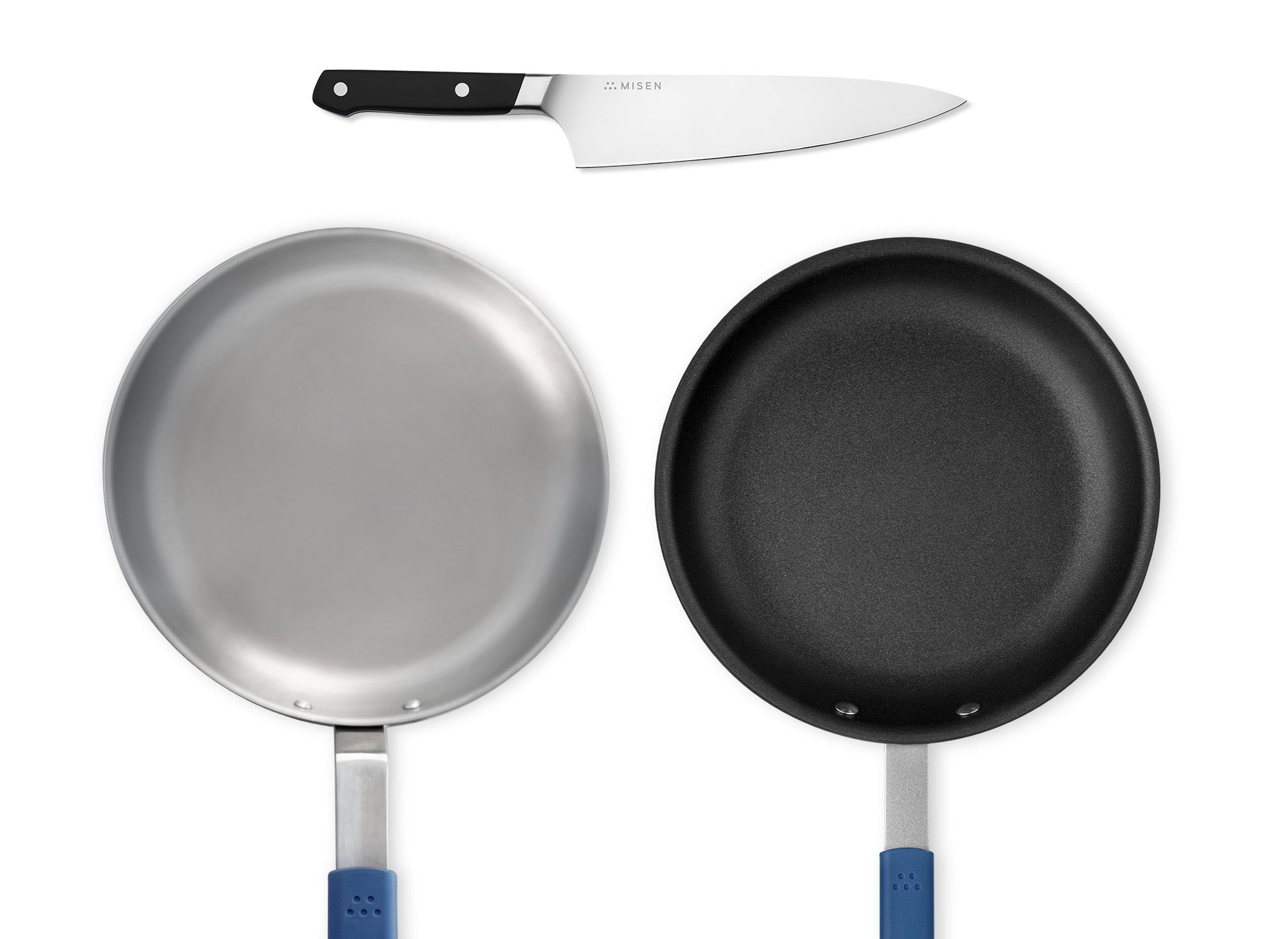 {{black}} A Black Misen Chef’s Knife, Misen Nonstick Pan, and Misen Carbon Steel Pan seen from directly overhead.
