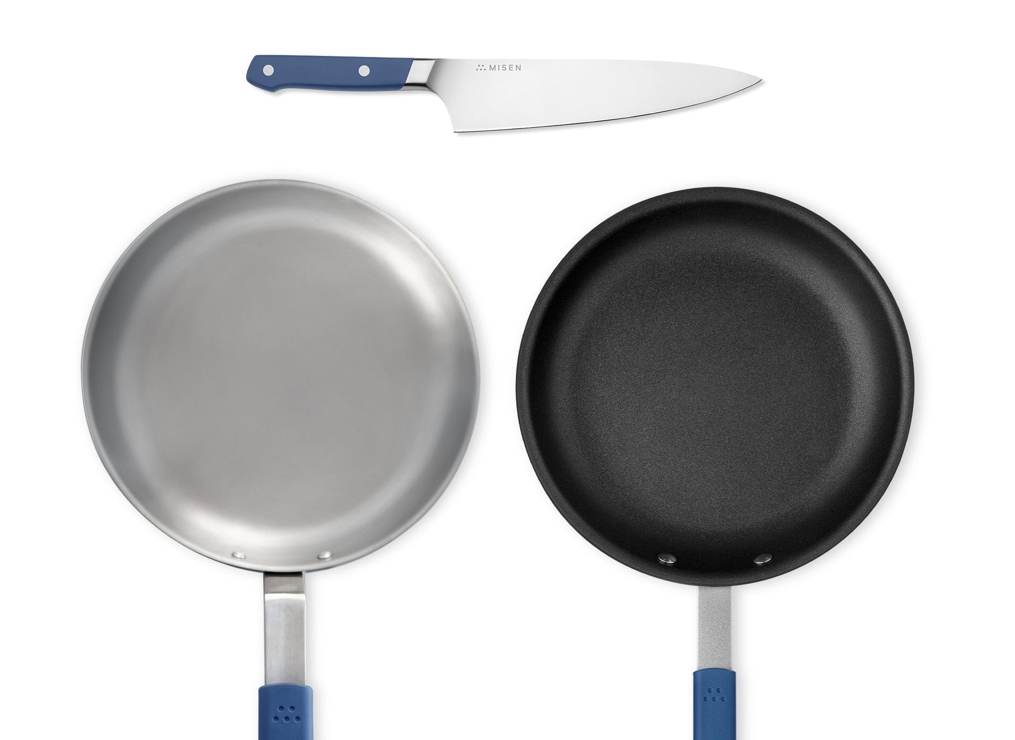{{blue}} A Blue Misen Chef’s Knife, Misen Nonstick Pan, and Misen Carbon Steel Pan seen from directly overhead.