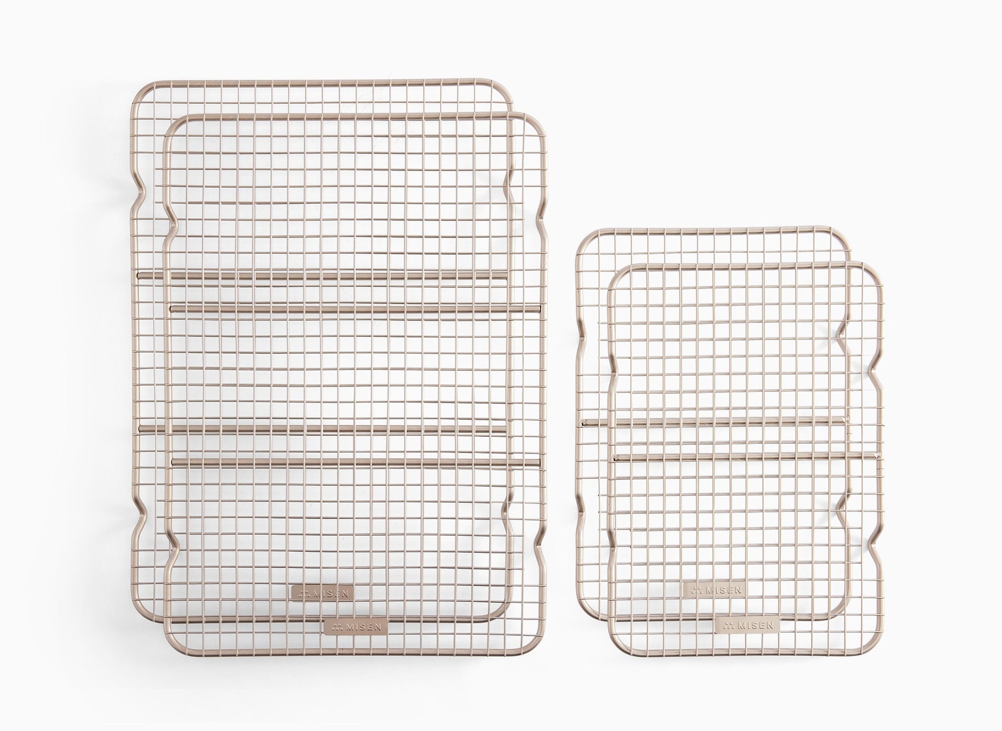 A bird’s eye view of a Misen Wire Rack Large Set — which includes two Quarter and two Half Sheets — on a white background.