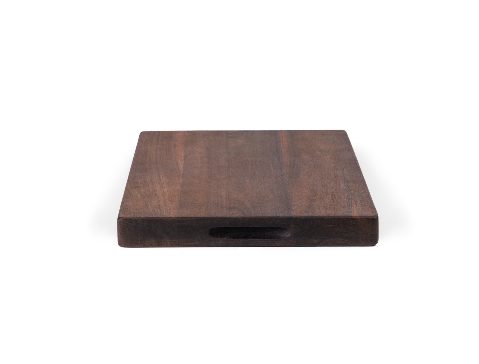 {{carbonized-acacia}} The Misen Cutting Board in acacia wood has a simple design and construction and is easy to use and store in the kitchen.