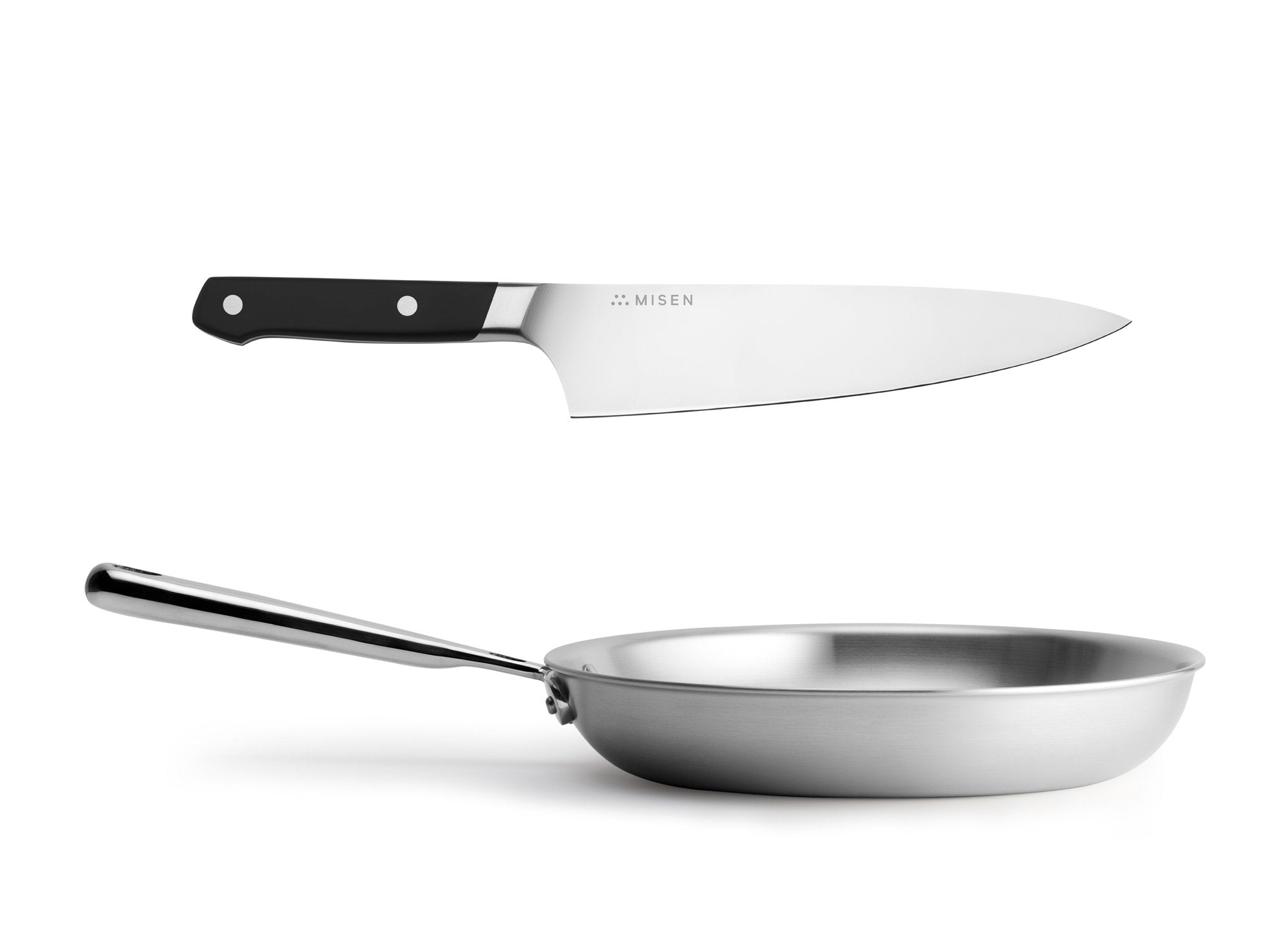 {{black}} The black Misen Chef's Knife & 10 inch Skillet Bundle is an essential workhorse in any kitchen.