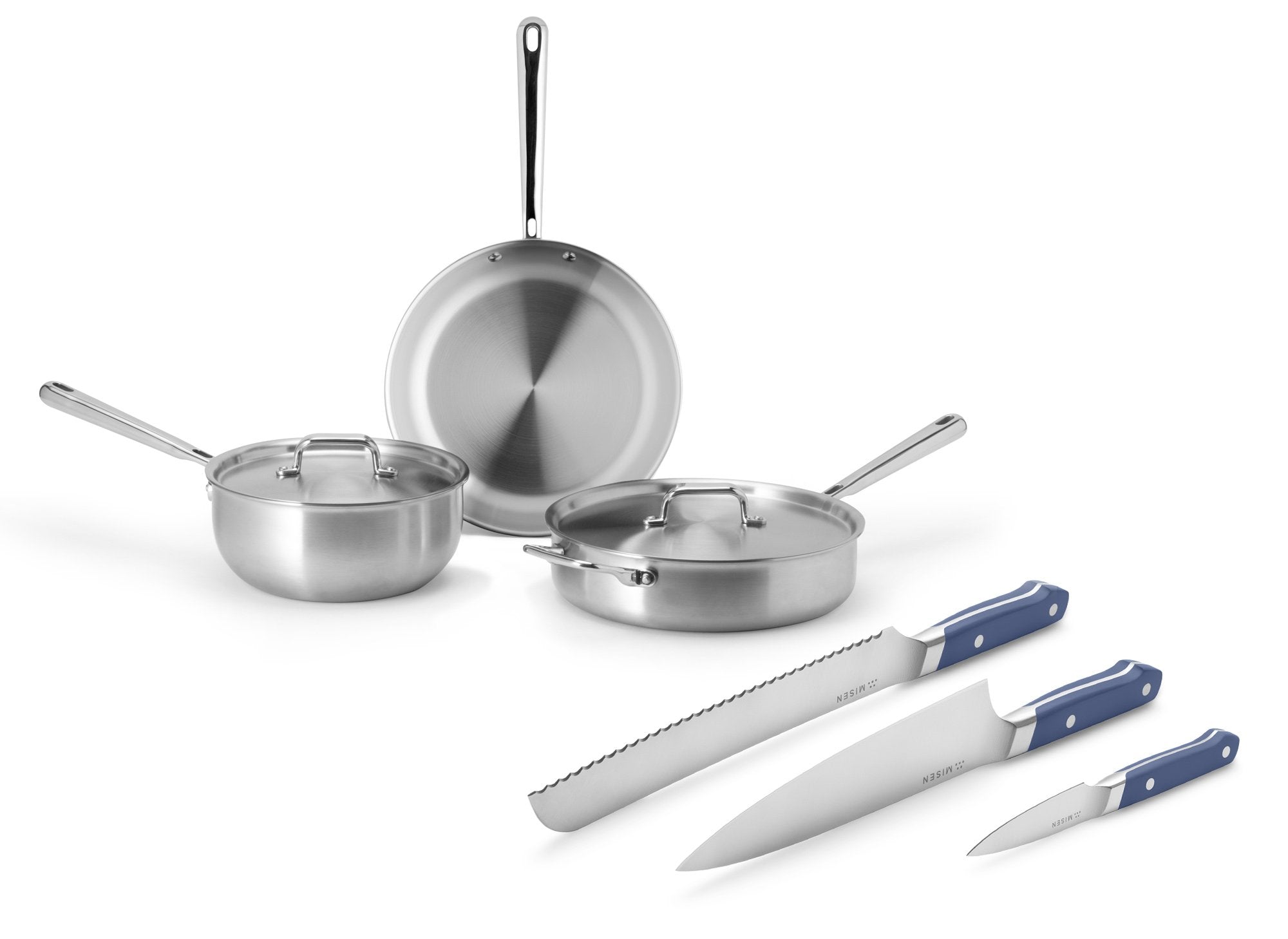 {{starter-blue}} The Misen Starter Cookware + Knife Bundle includes the Starter Cookware Set and the 3 piece Essentials Knife Set in blue.