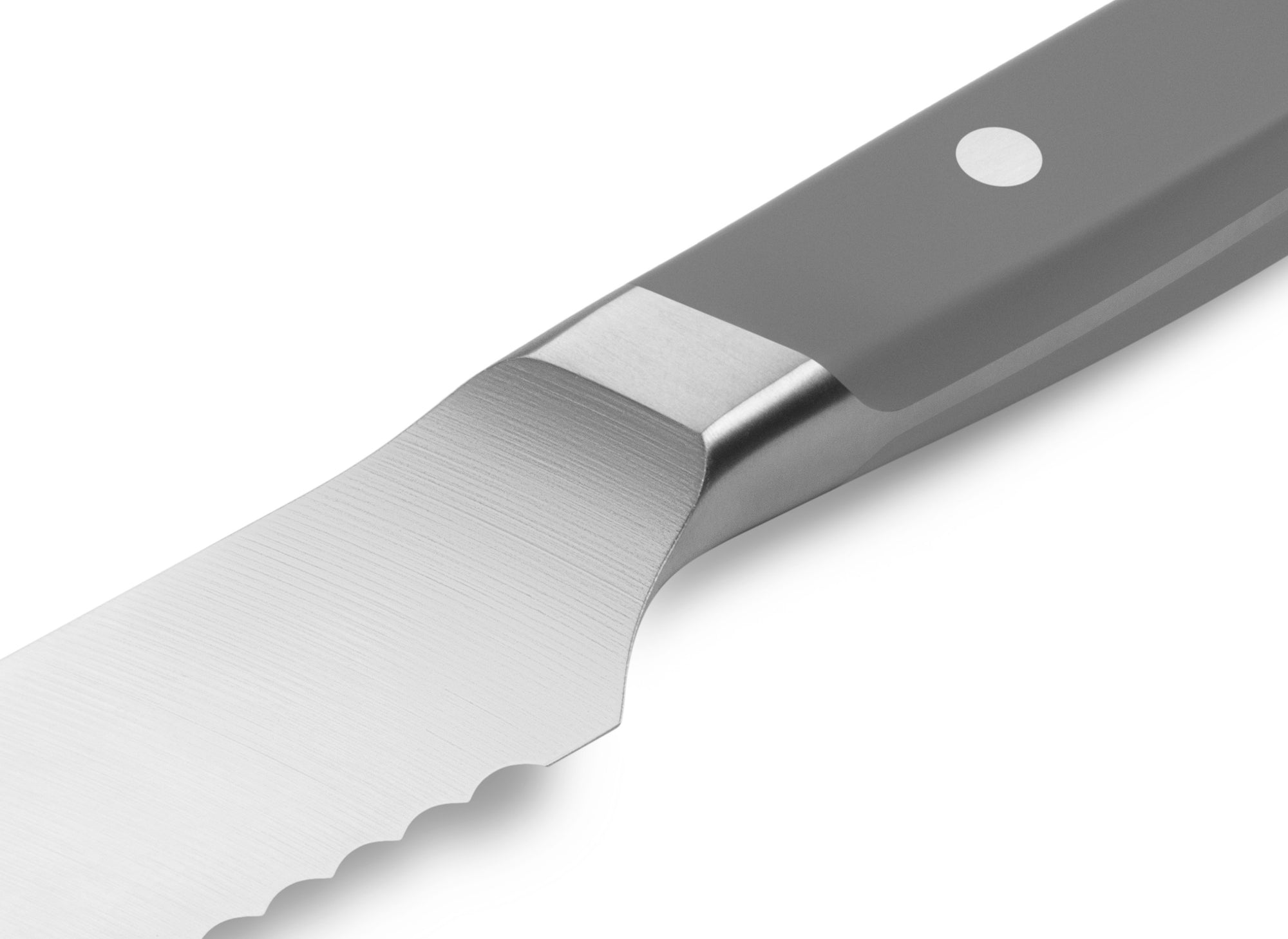 {{gray}} The Misen Serrated Knife in gray features a unique sloped bolster.